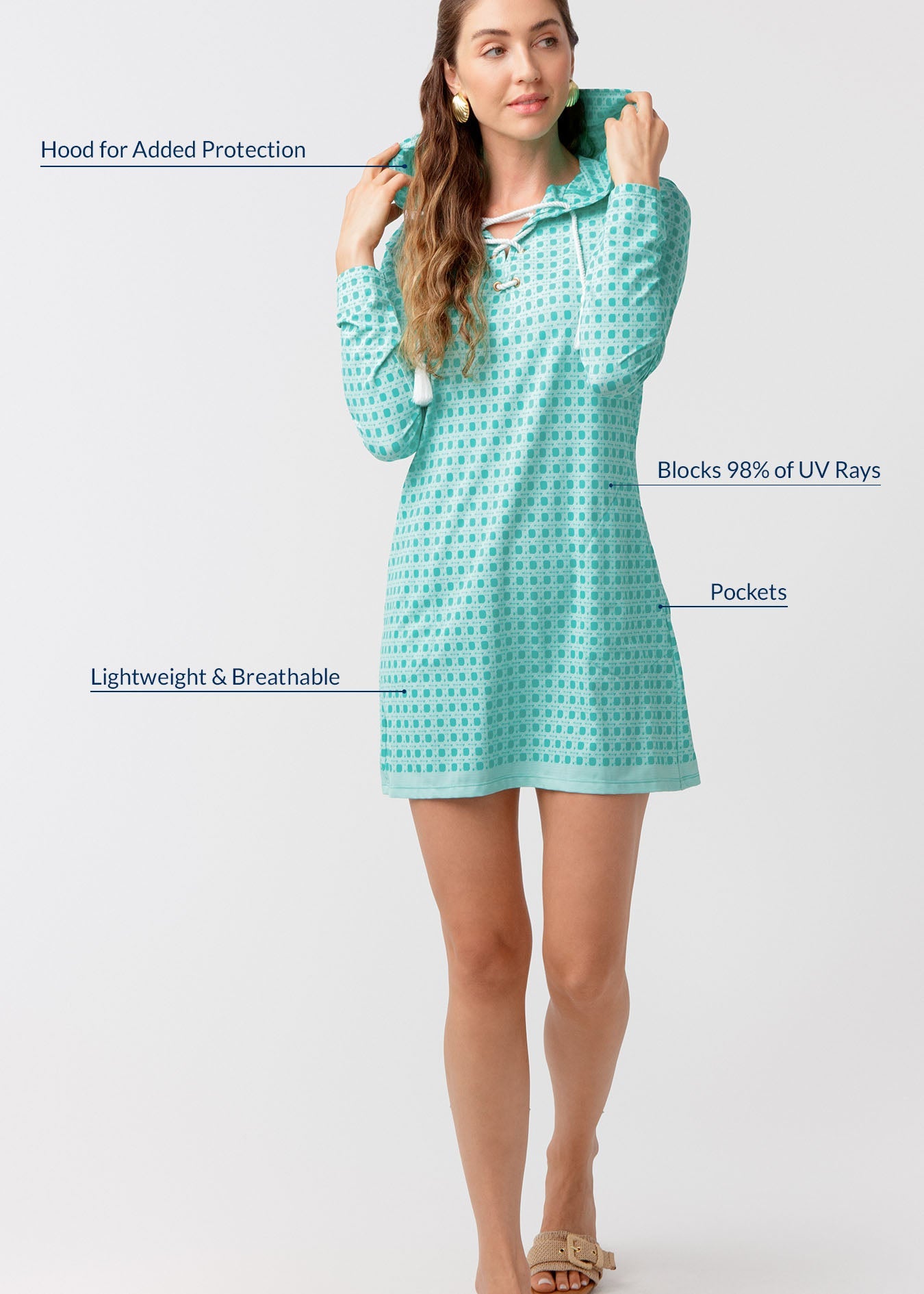 Woman wearing a light blue dress with text highlighting features on a white background