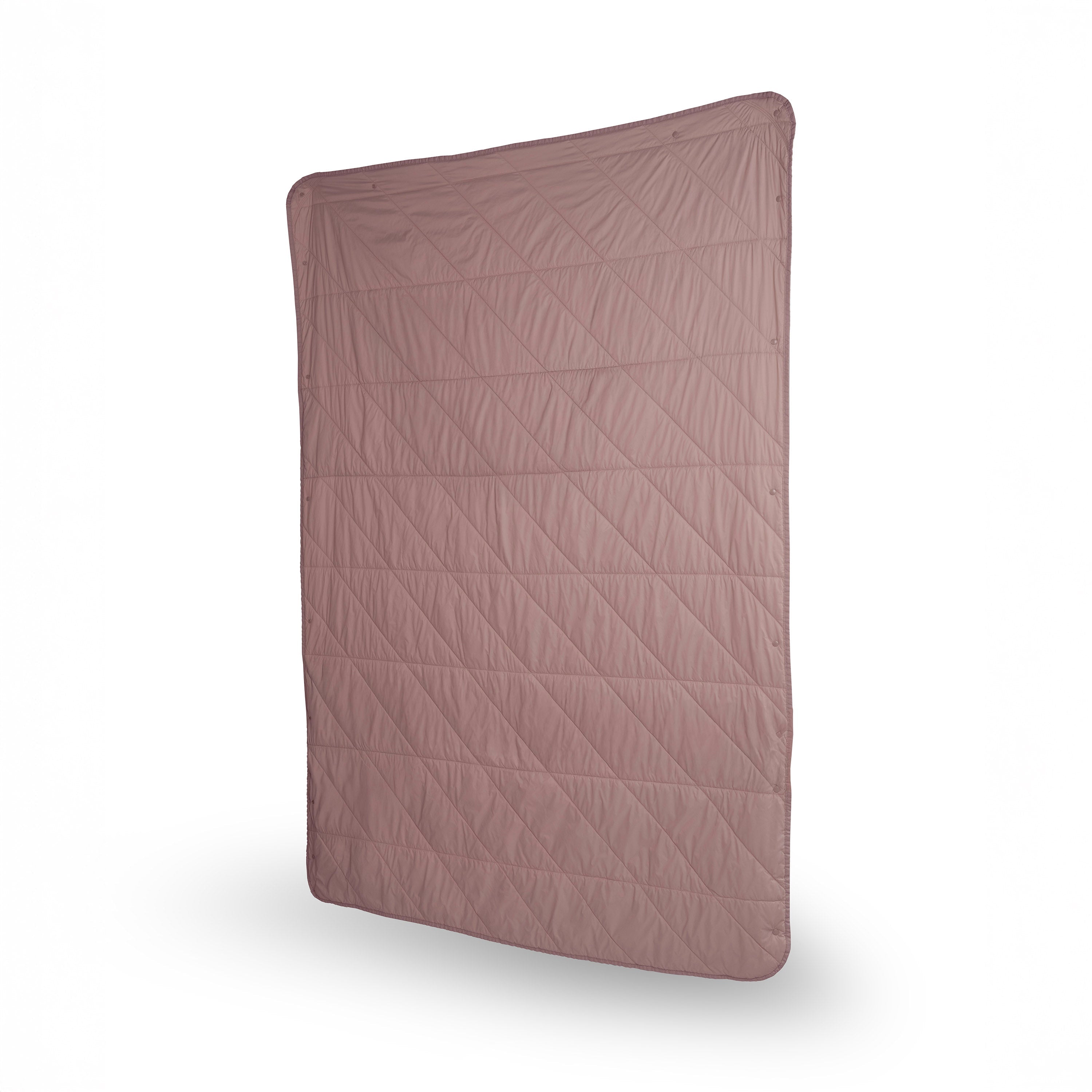 Quilted pink cover on a white background