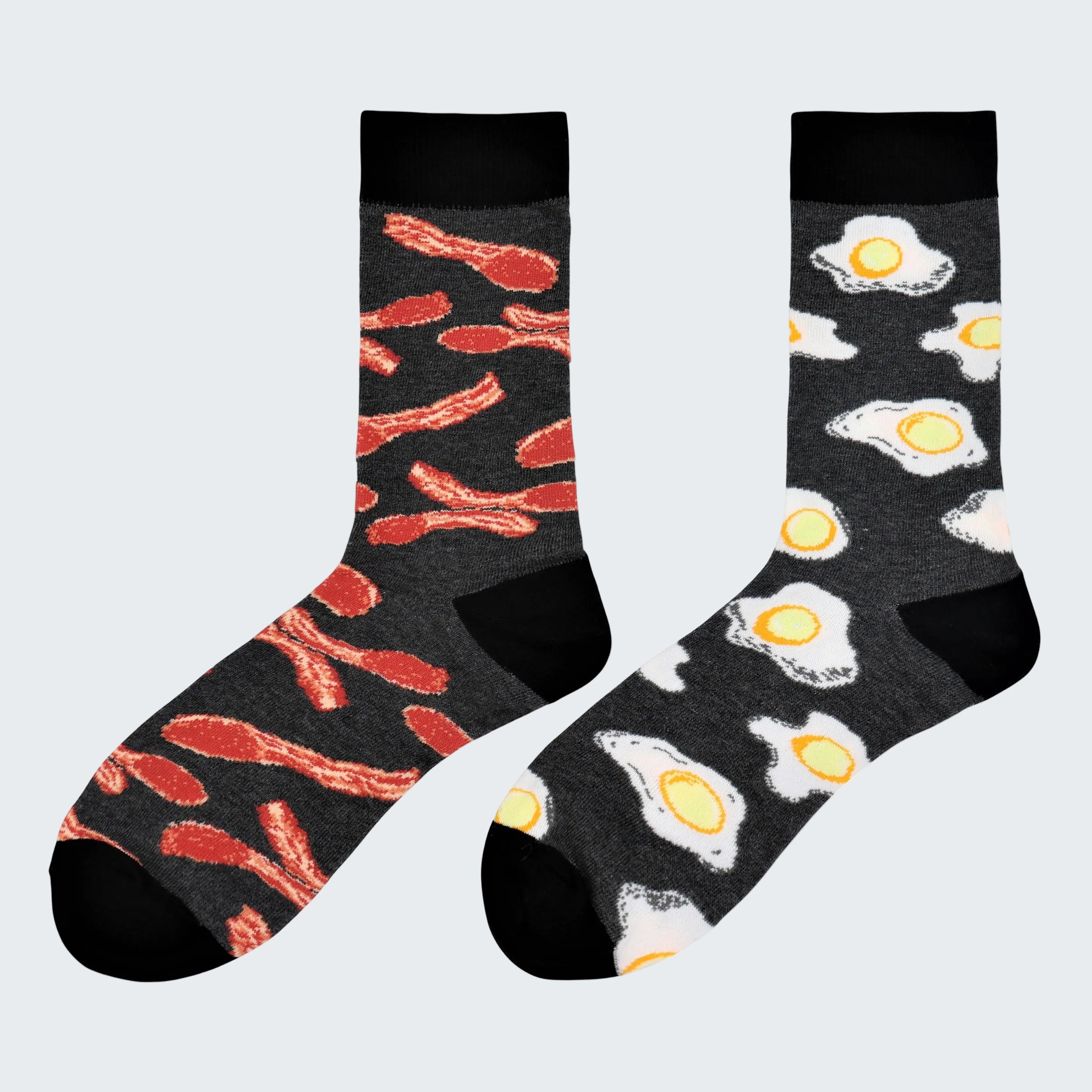 Two socks with breakfast-themed patterns on a white background