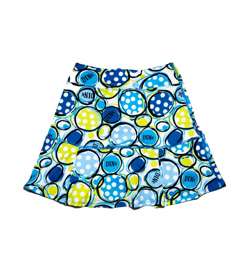 Skirt with blue, yellow, and white polka dot pattern on a white background