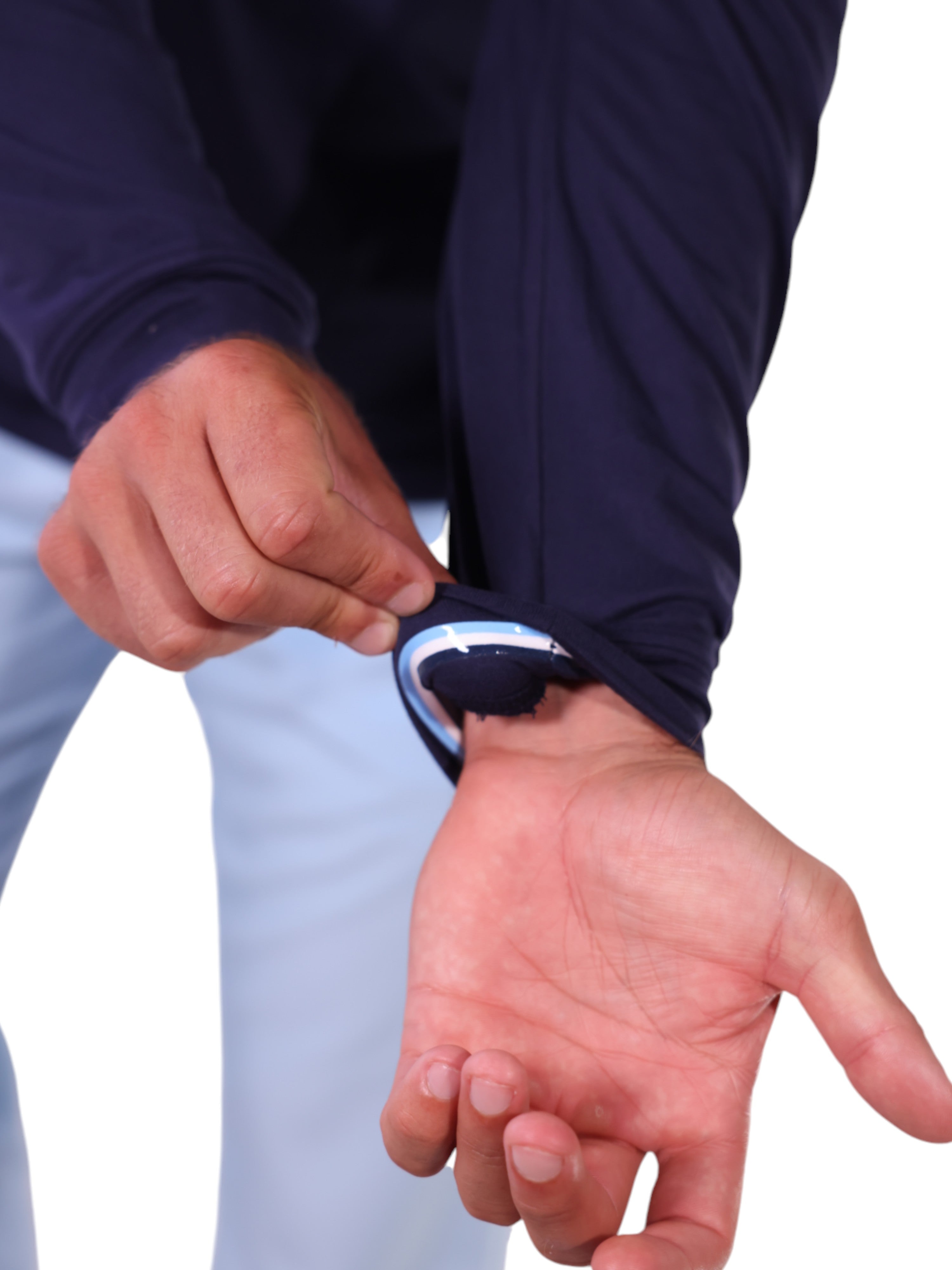 Person adjusting a watch on their wrist against a white background