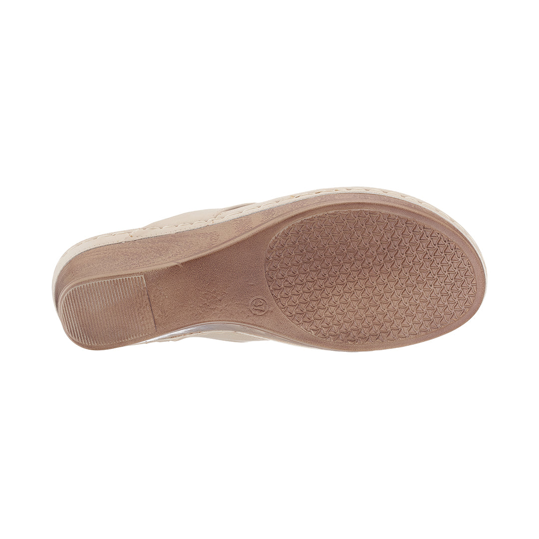 Tan shoe sole on a white background