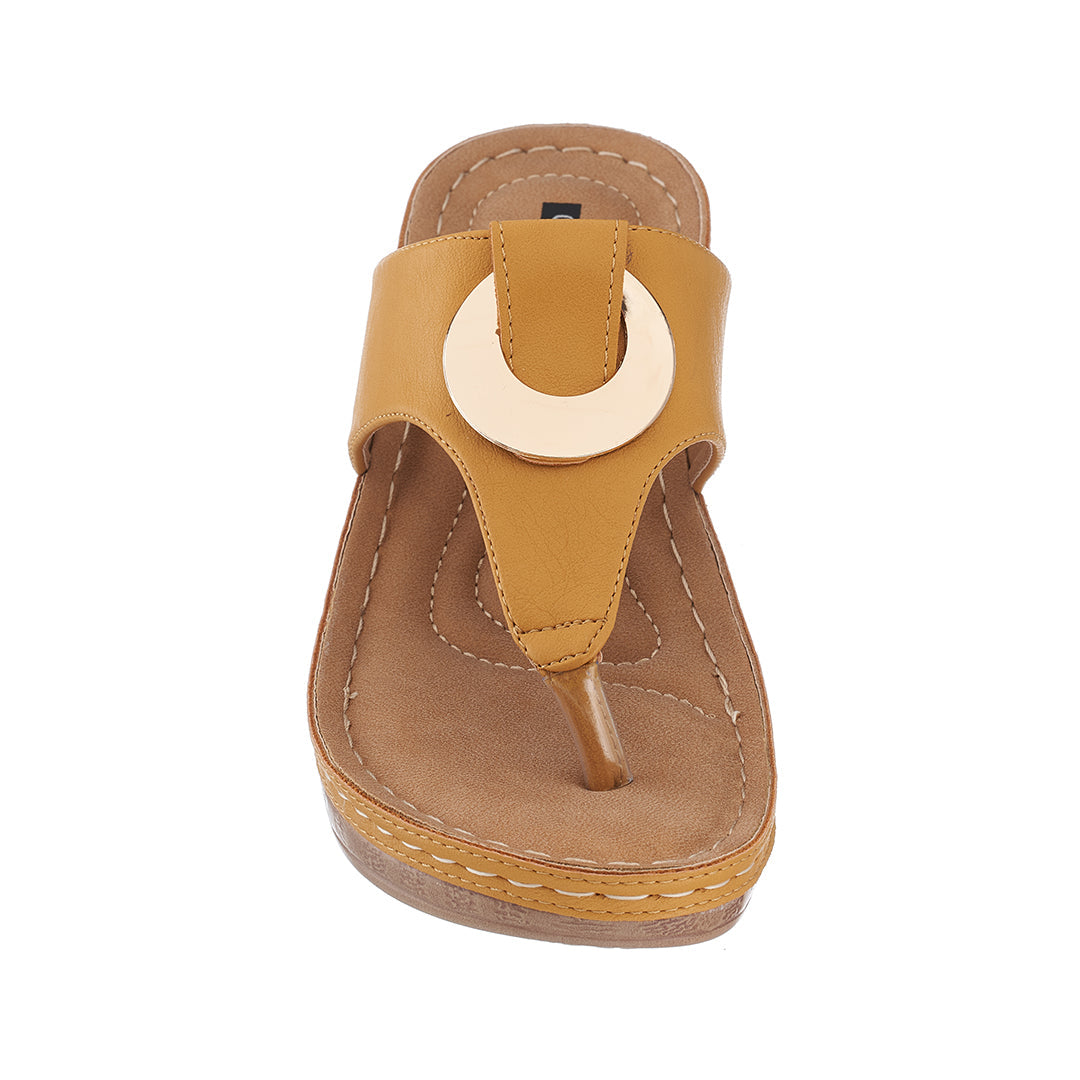 Brown sandal with a circular design on a white background