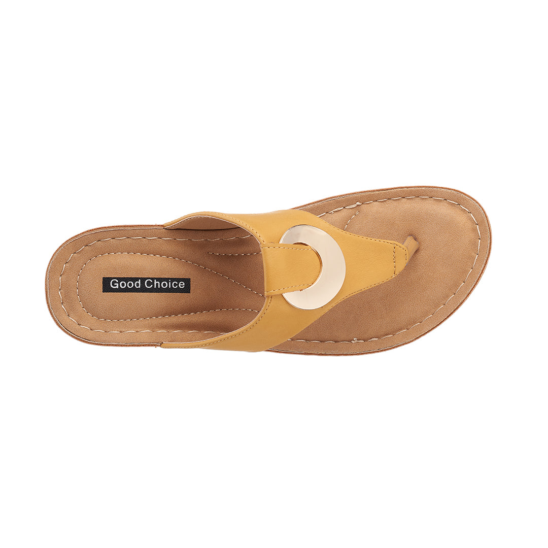 Yellow sandal with a circular design on a white background