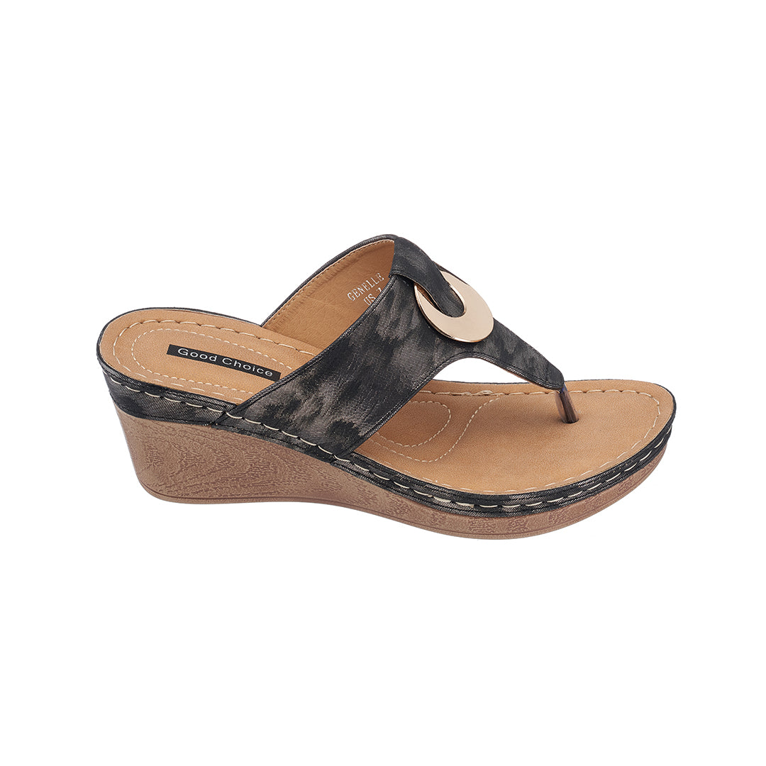 Wedge sandal with black strap and tan wedge on a white background