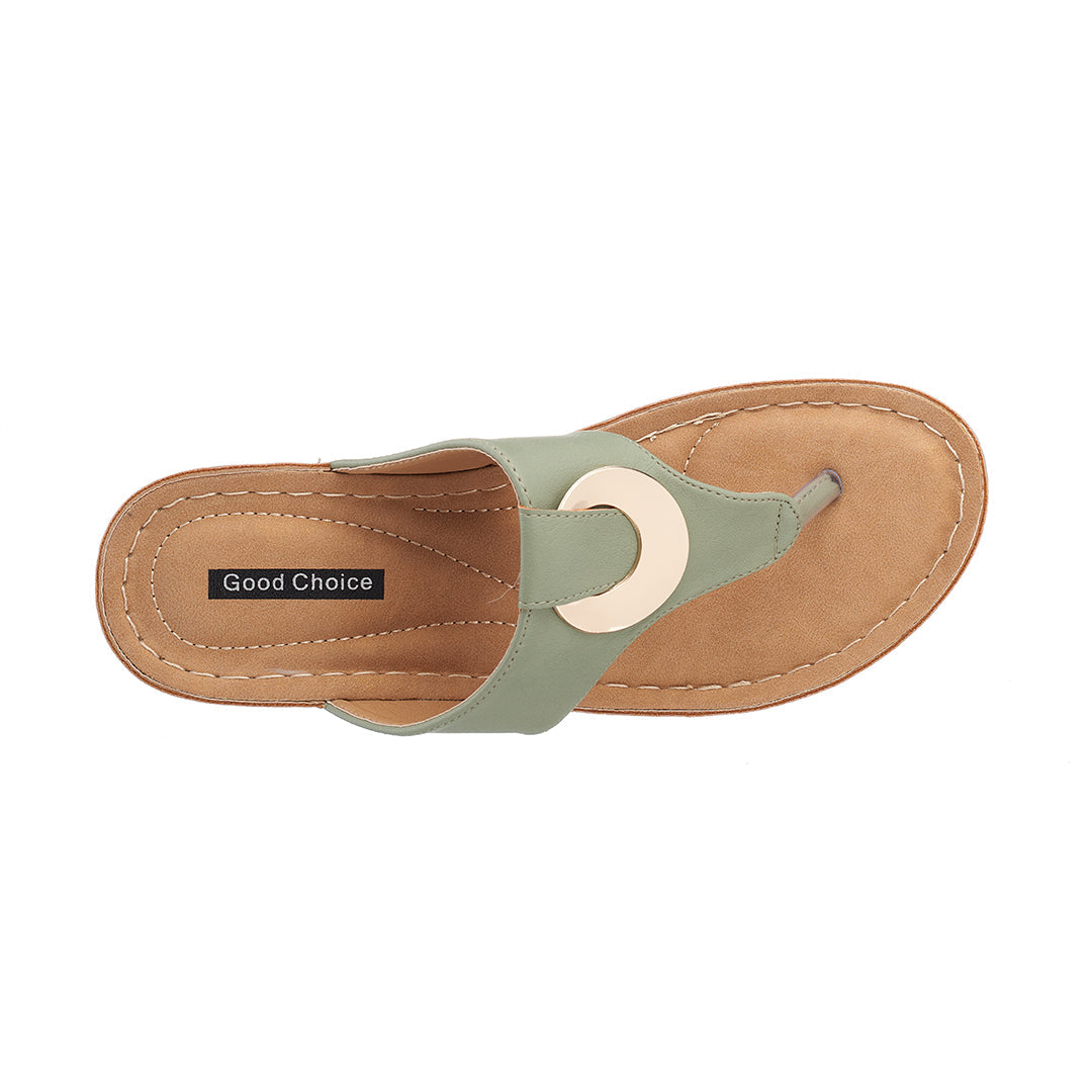 Sandal with a green insole and brown outer sole on a white background