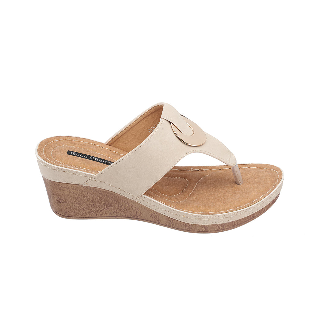 Beige wedge sandal on a white background