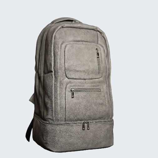 Gray backpack on a red background