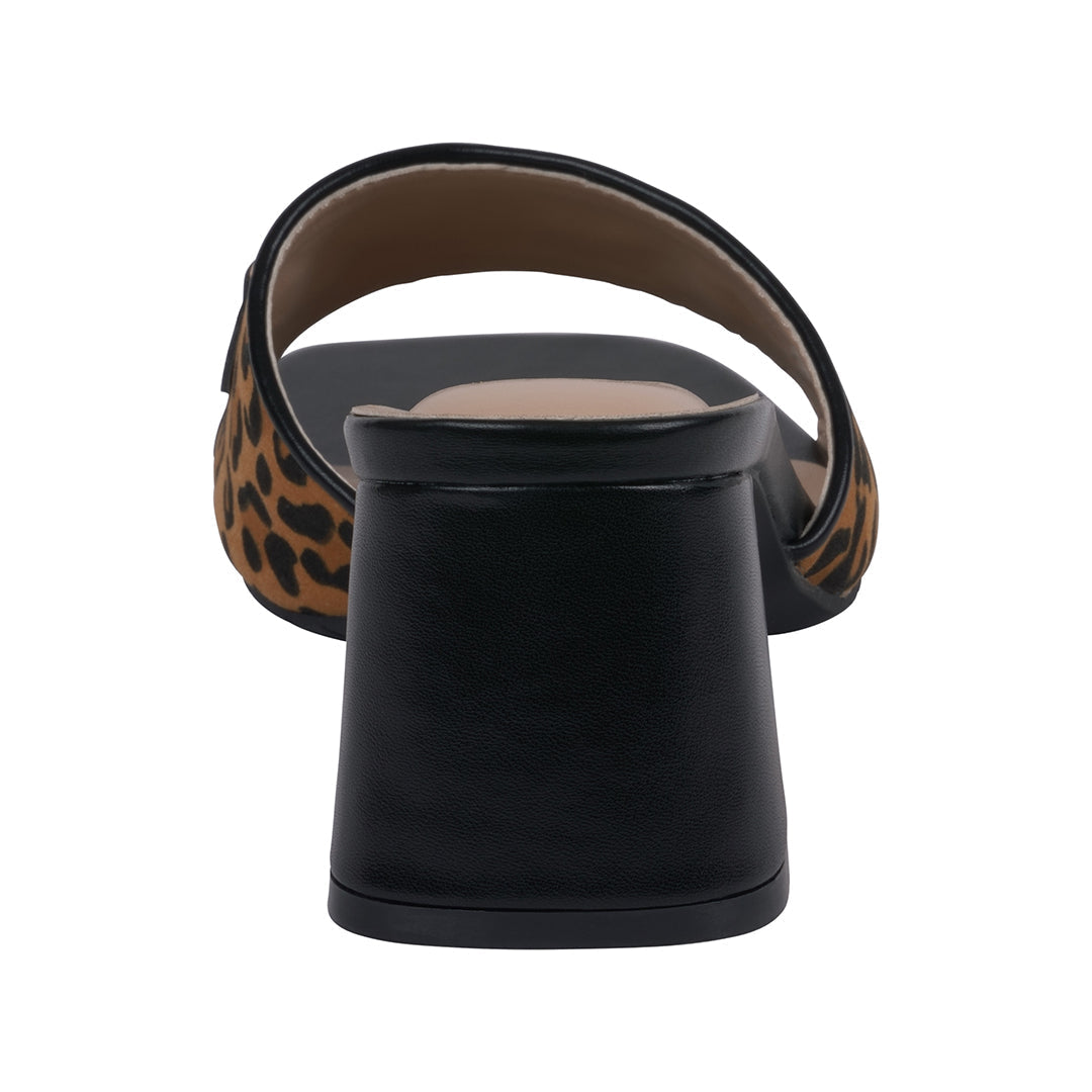 Black sandal with leopard print strap on a white background