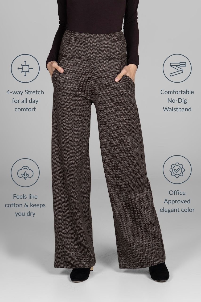 Brown herringbone pants with text highlighting features on a gray background