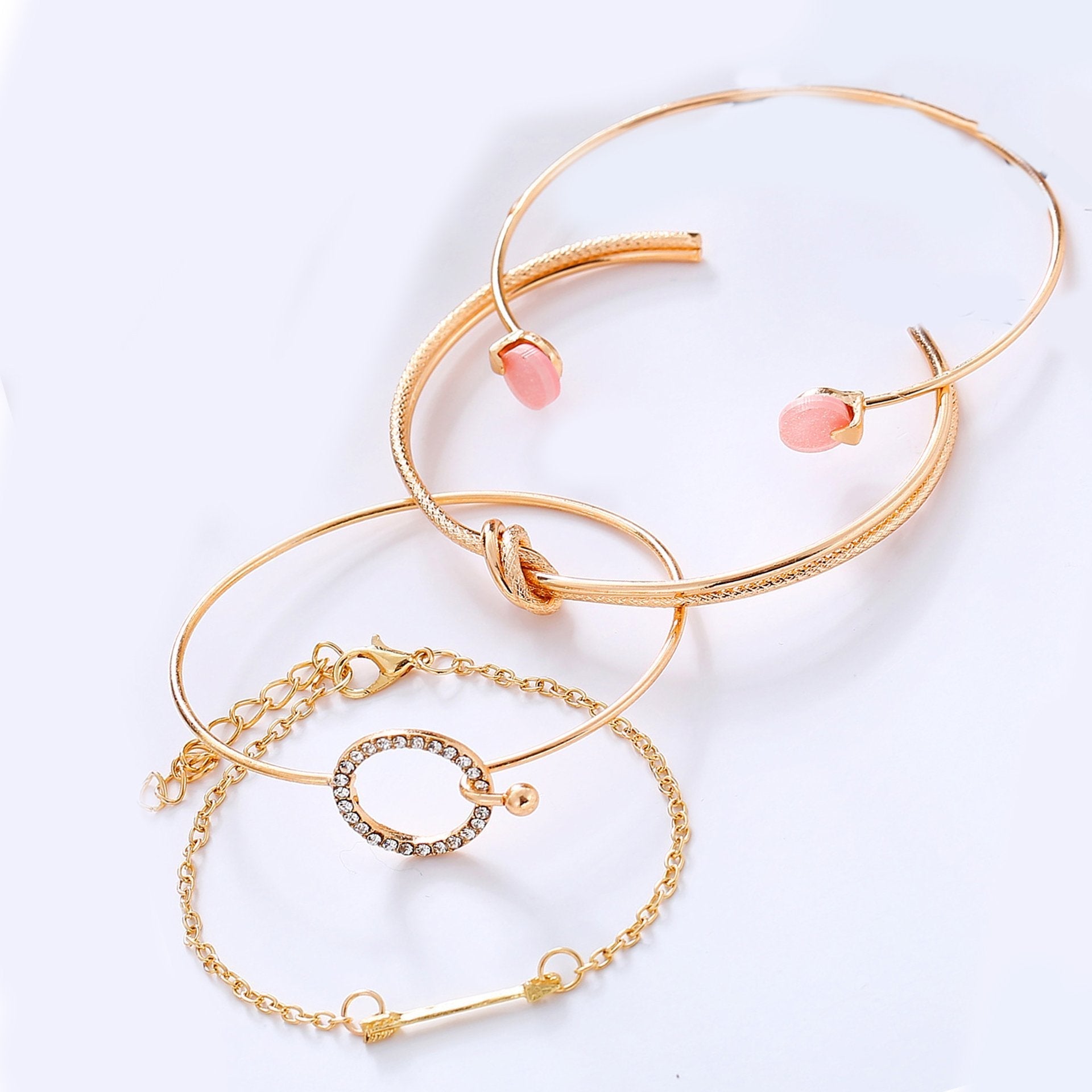 Four Piece Pink Bracelet Set