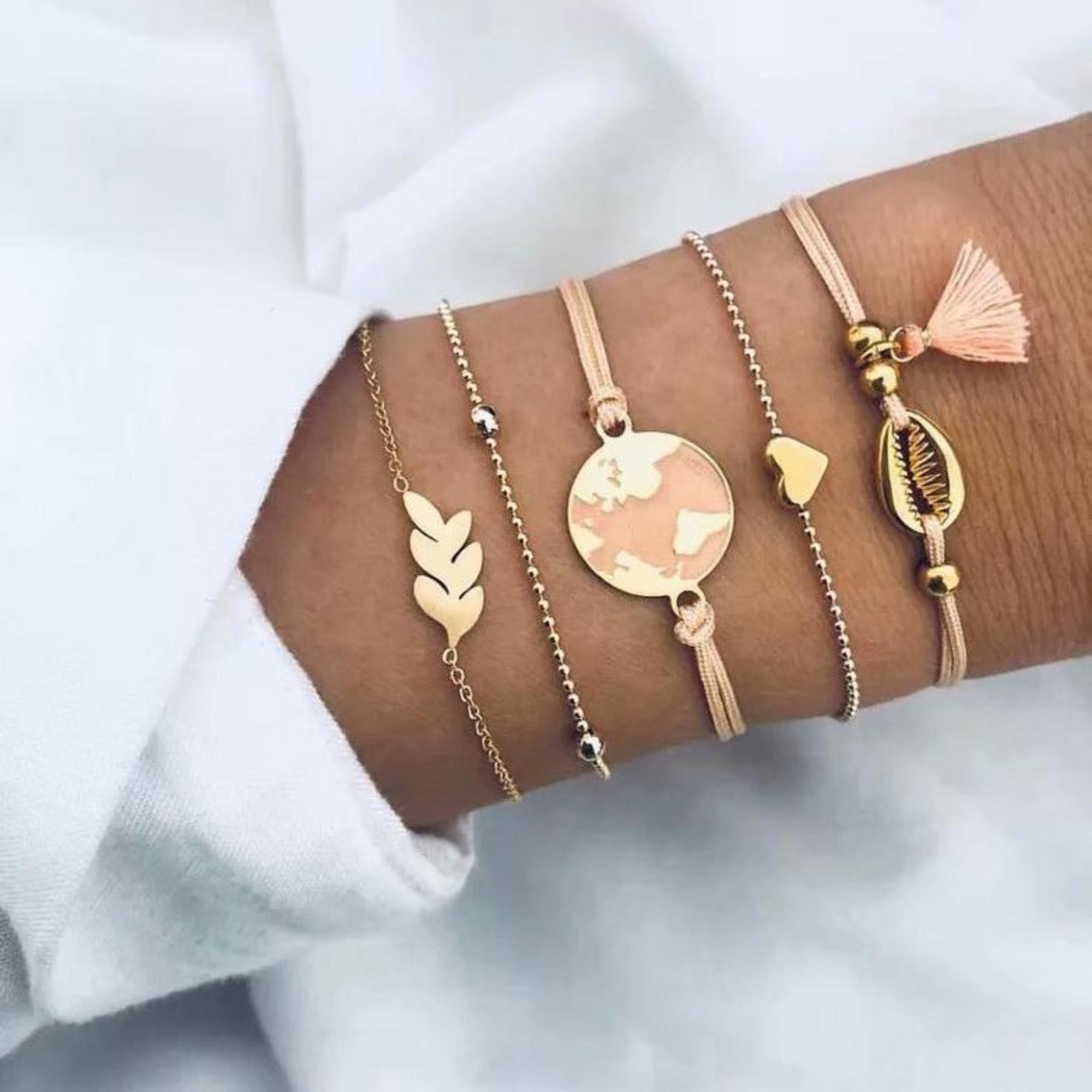 Five Piece Pink Global Tassel Bracelet Set