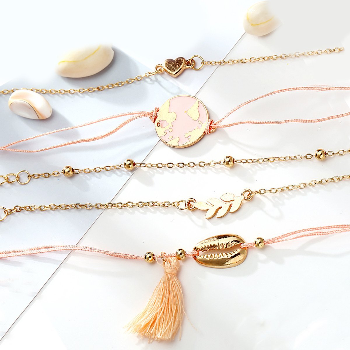 Five Piece Pink Global Tassel Bracelet Set