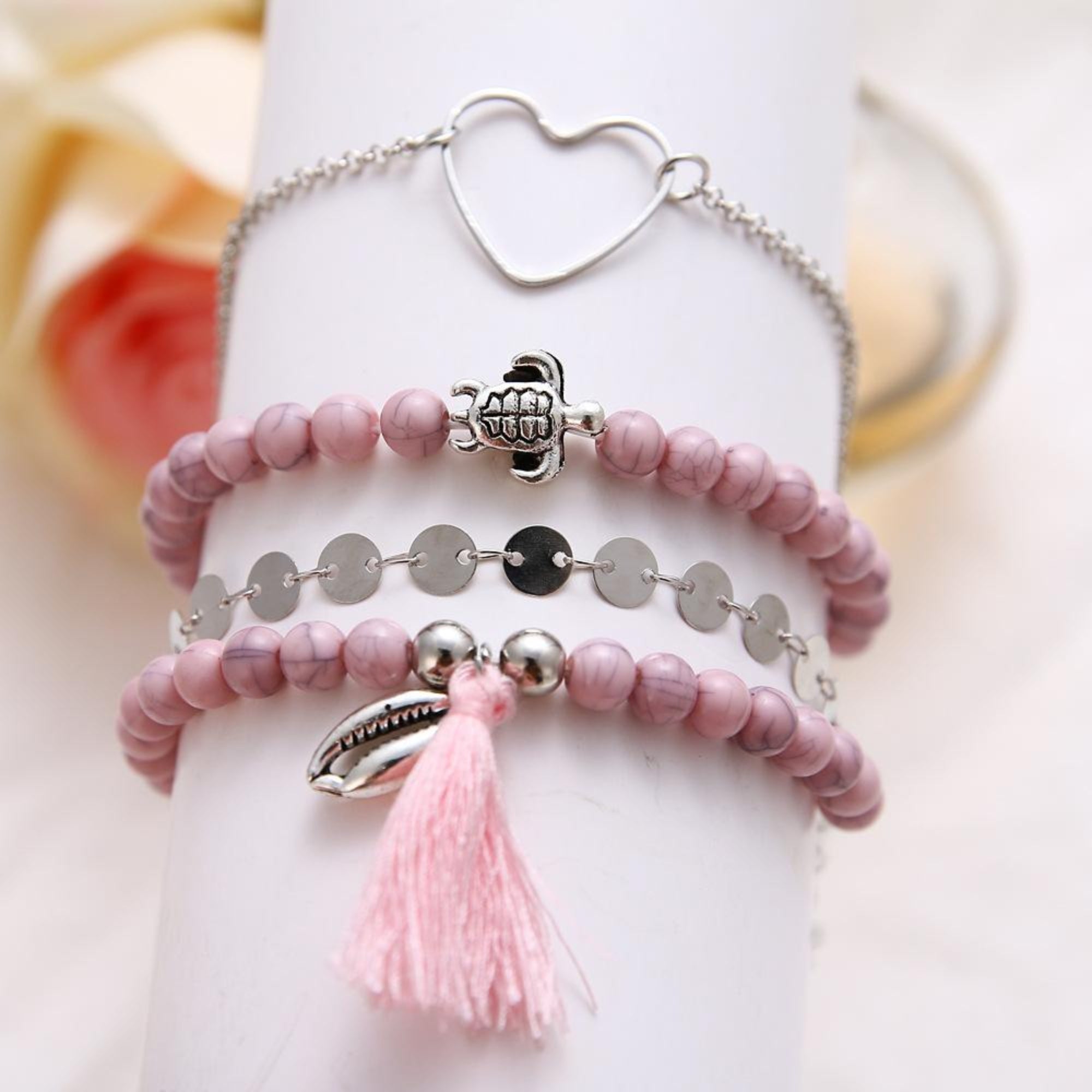 Four Piece Pink Tassel Bracelet Set 