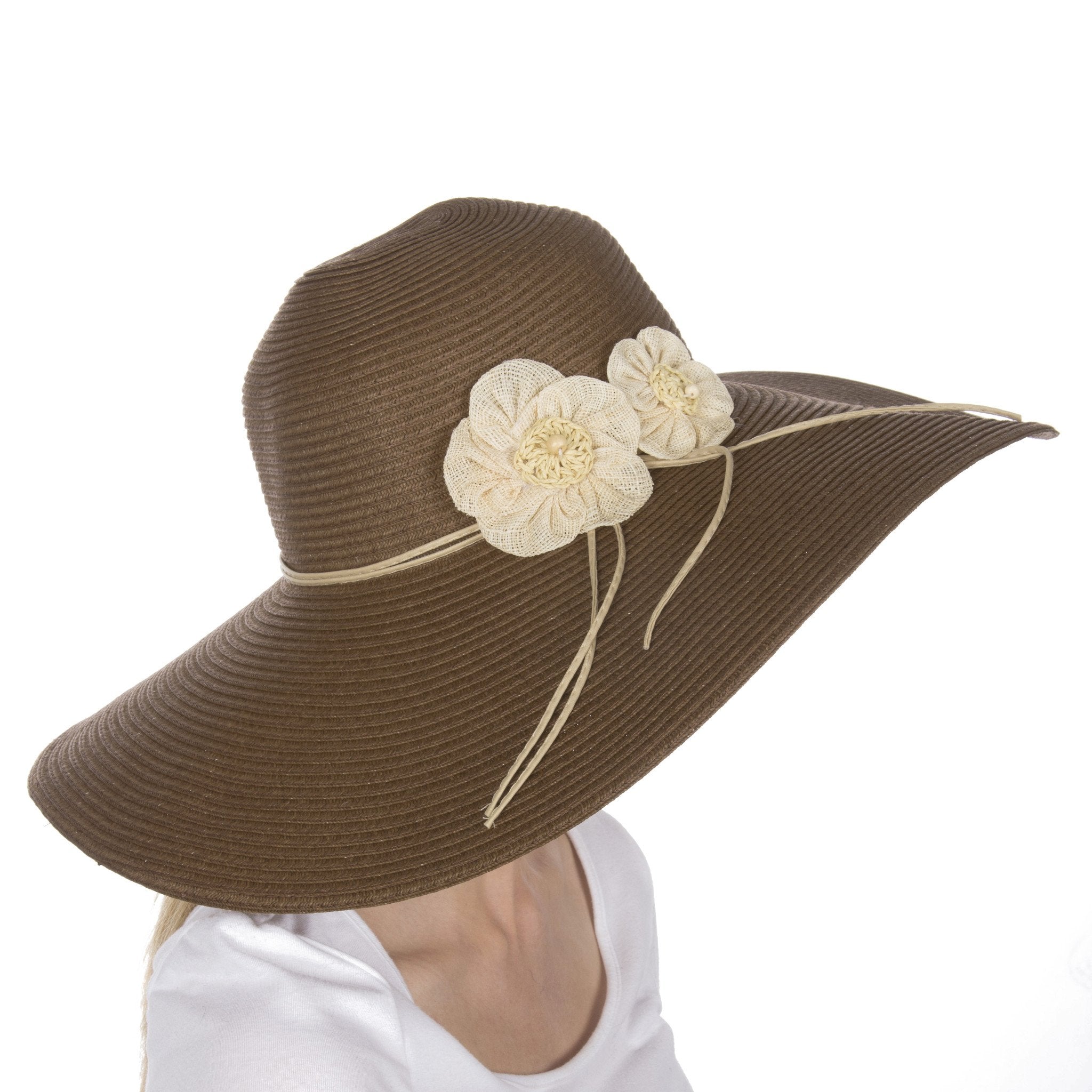 Brown sun hat with floral embellishments on a white background