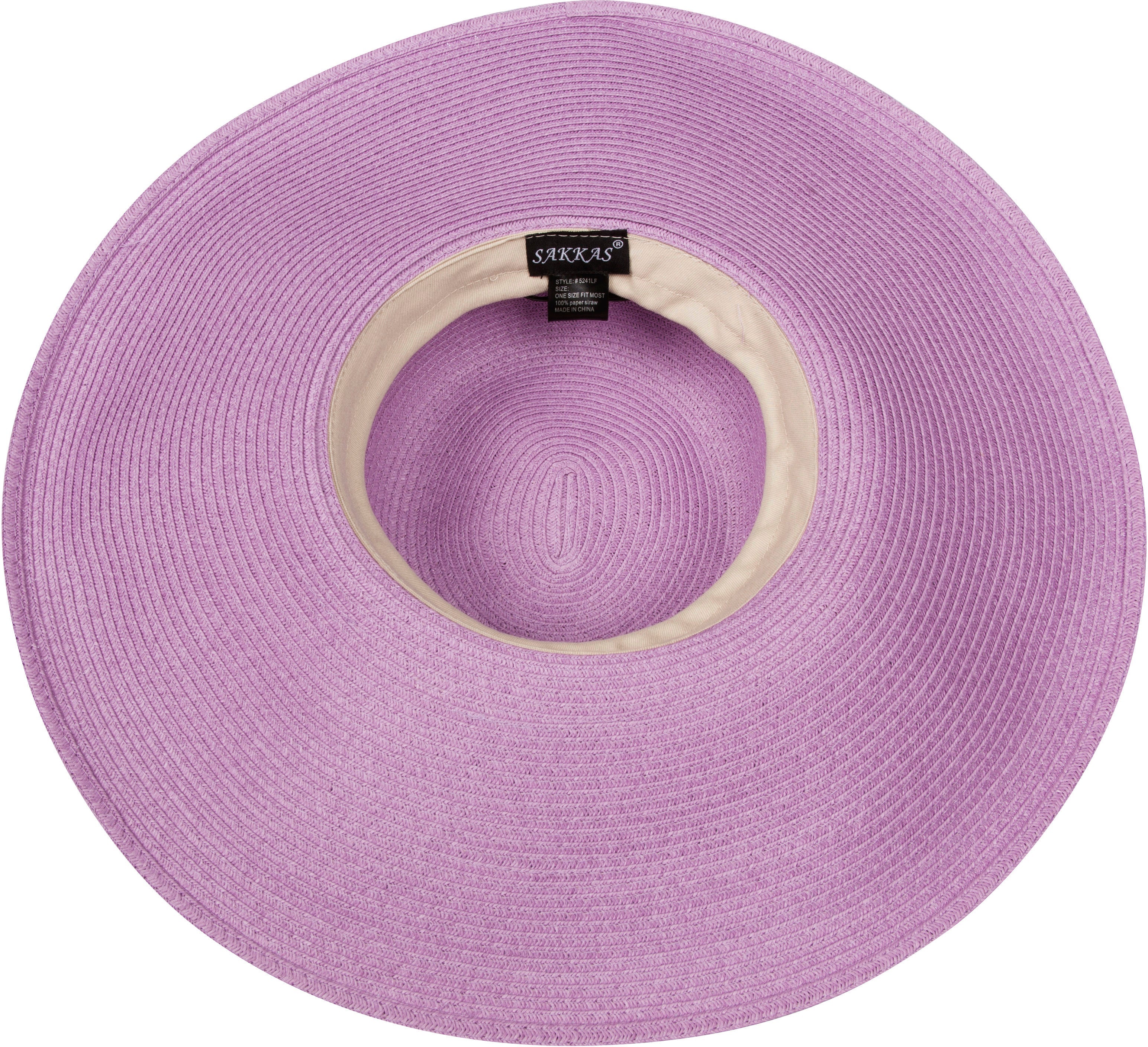 Purple straw hat with beige interior and visible brand label on a white background