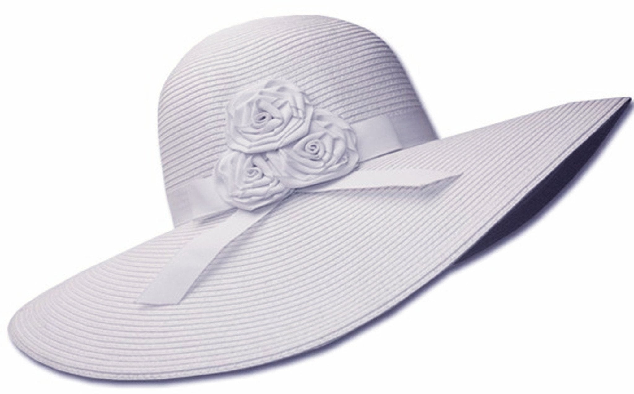 White sun hat with a floral embellishment on a white background