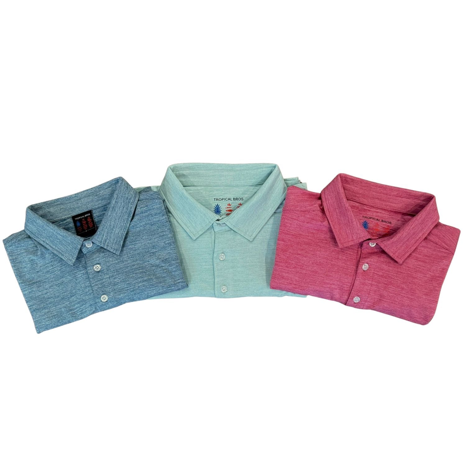 Three folded polo shirts in blue, green, and pink on a white background