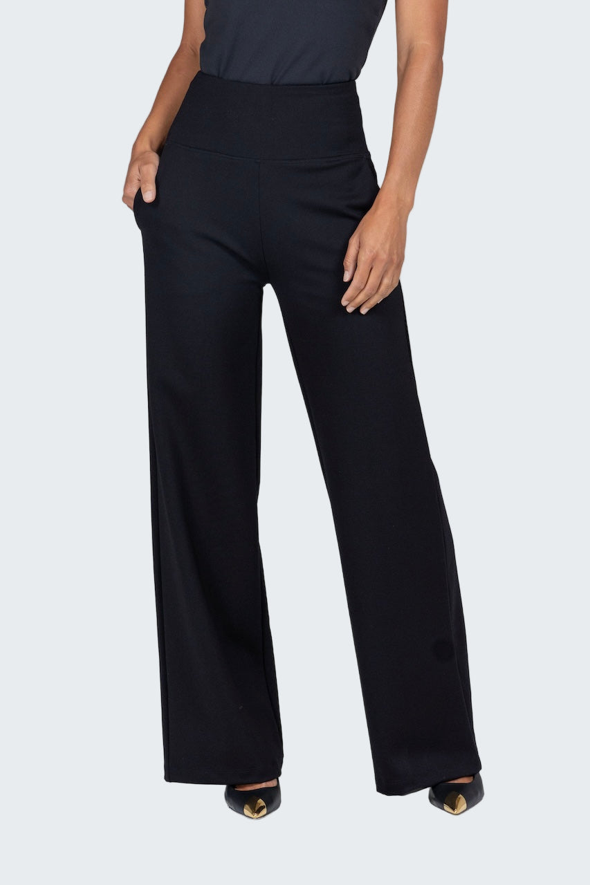 Black wide-leg pants worn by a person on a white background