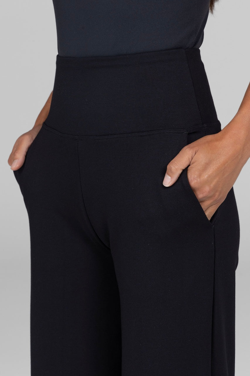 Black pants with a plain background