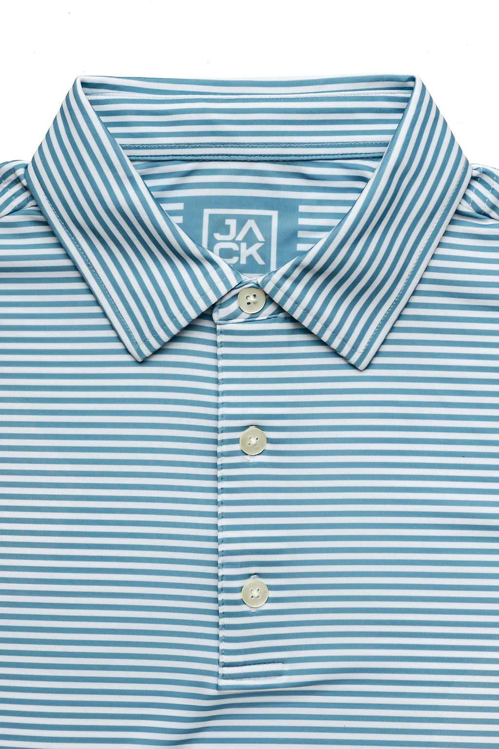 Close-up of a blue and white striped polo shirt with a brand logo on a white background