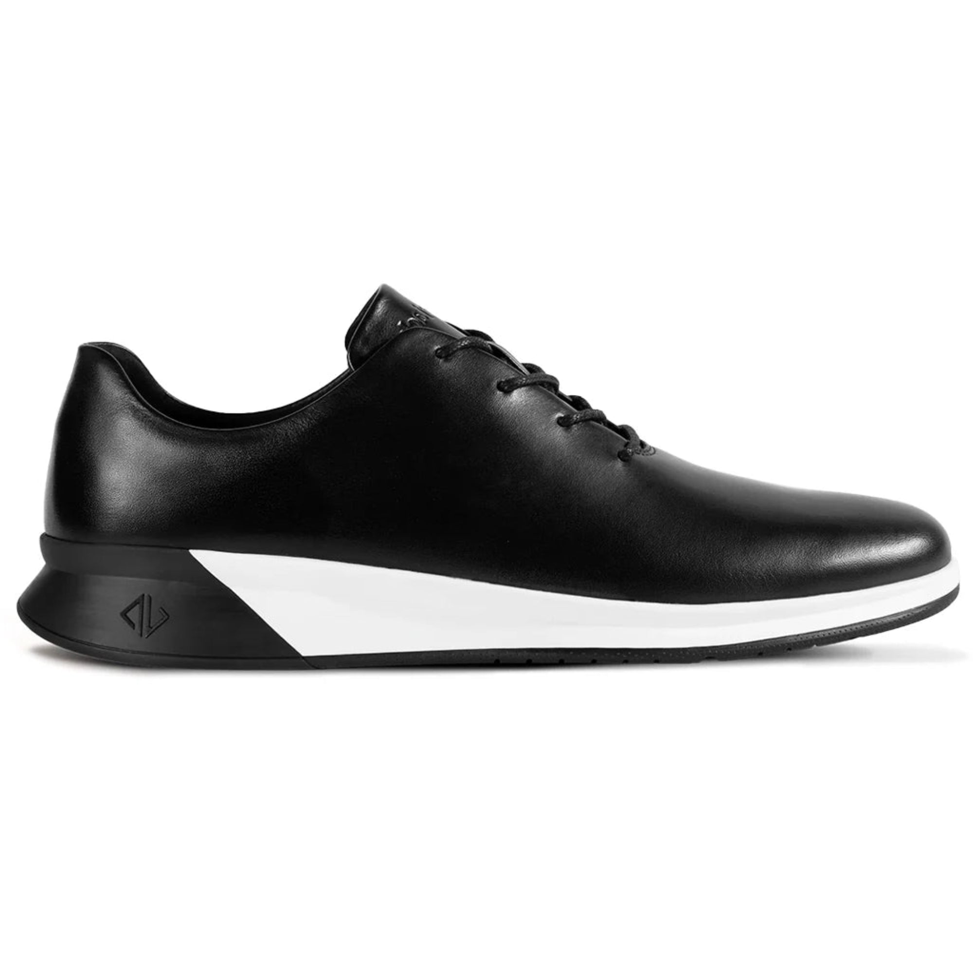 Black leather shoe with white sole on a white background