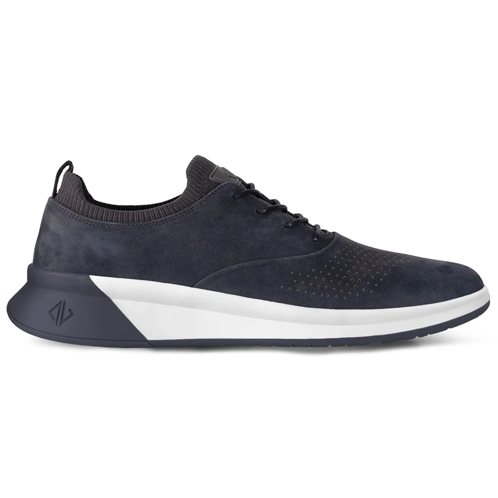 Navy blue athletic shoe with a white sole on a white background
