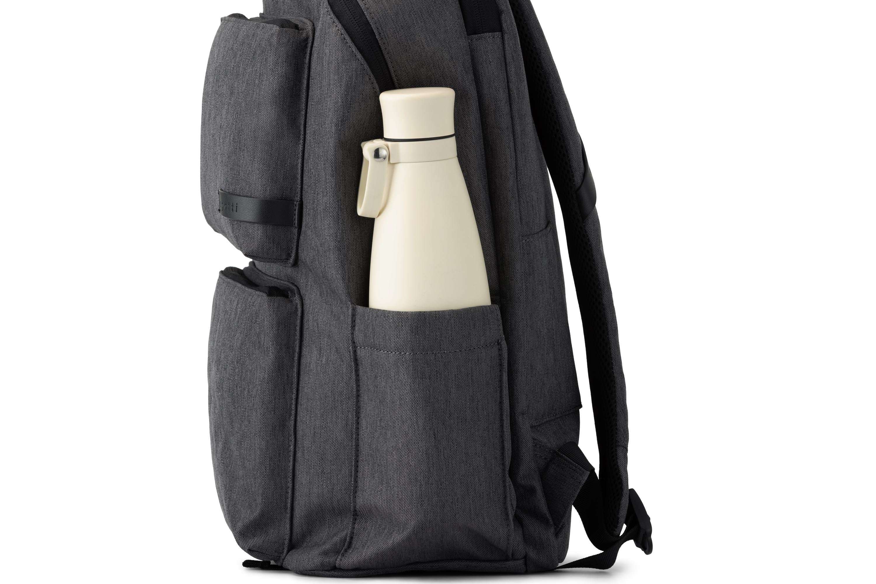 Gray backpack with a white water bottle in a front pocket on a white background