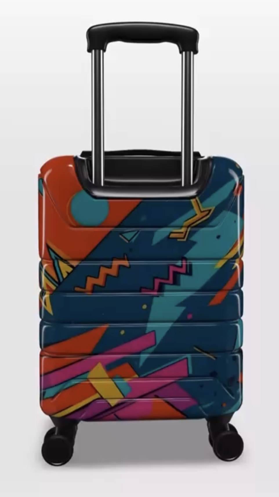 Colorful geometric-patterned suitcase on a white background