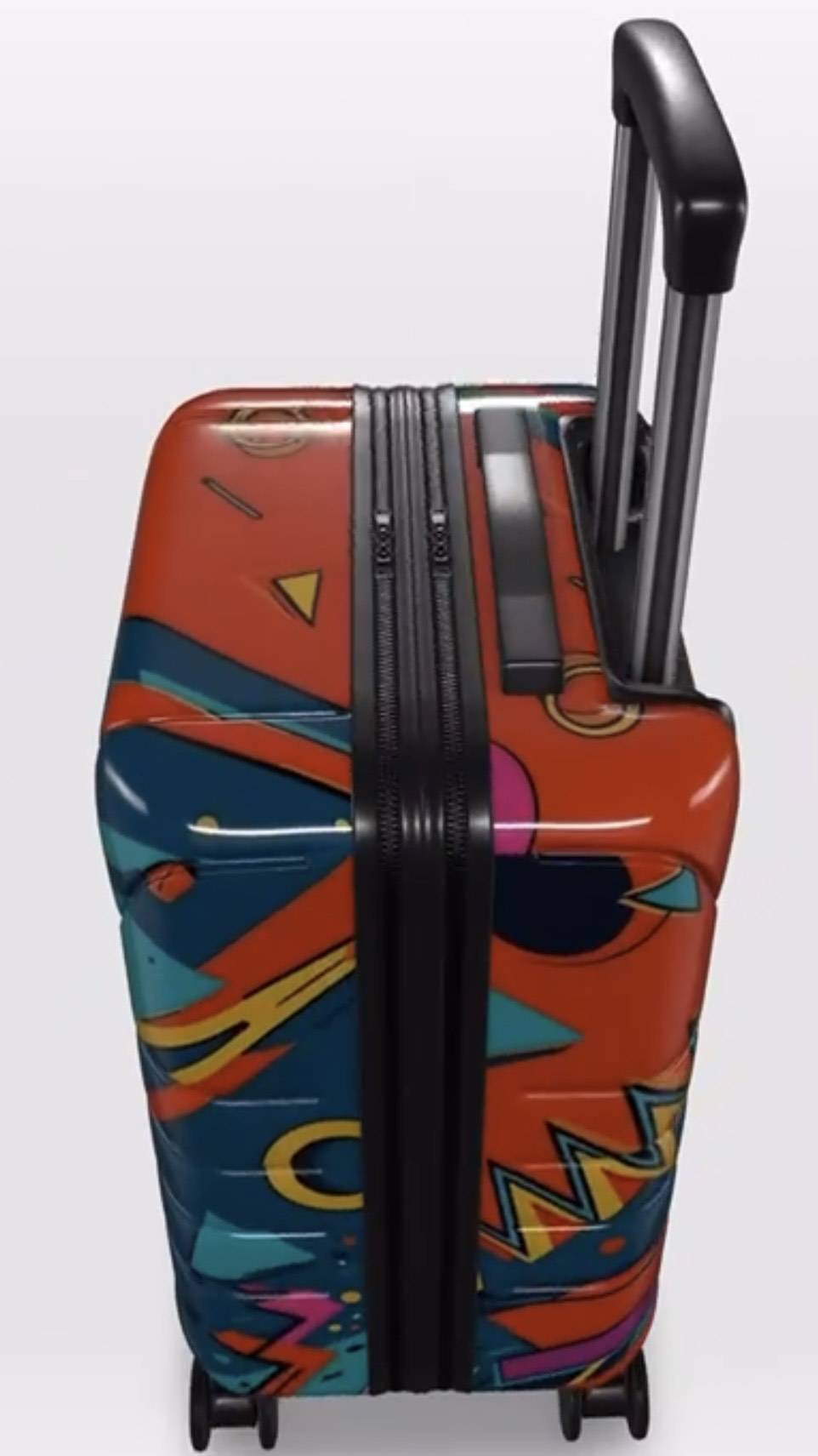 Colorful suitcase with abstract design on a white background