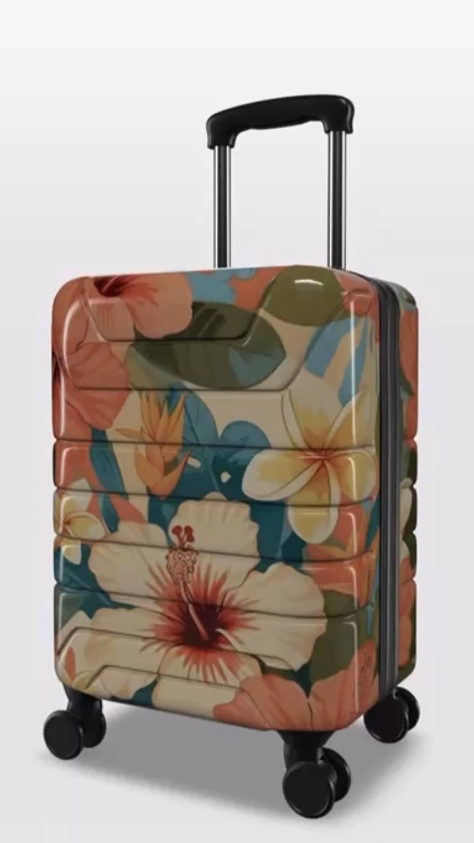 Floral-patterned suitcase on a white background