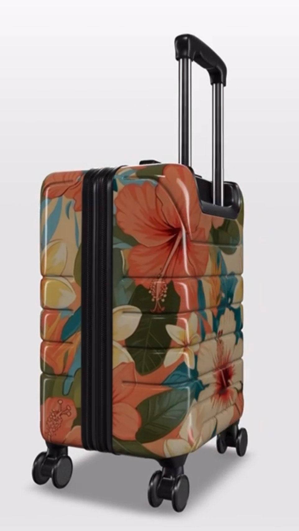 Floral-patterned suitcase on a light gray background