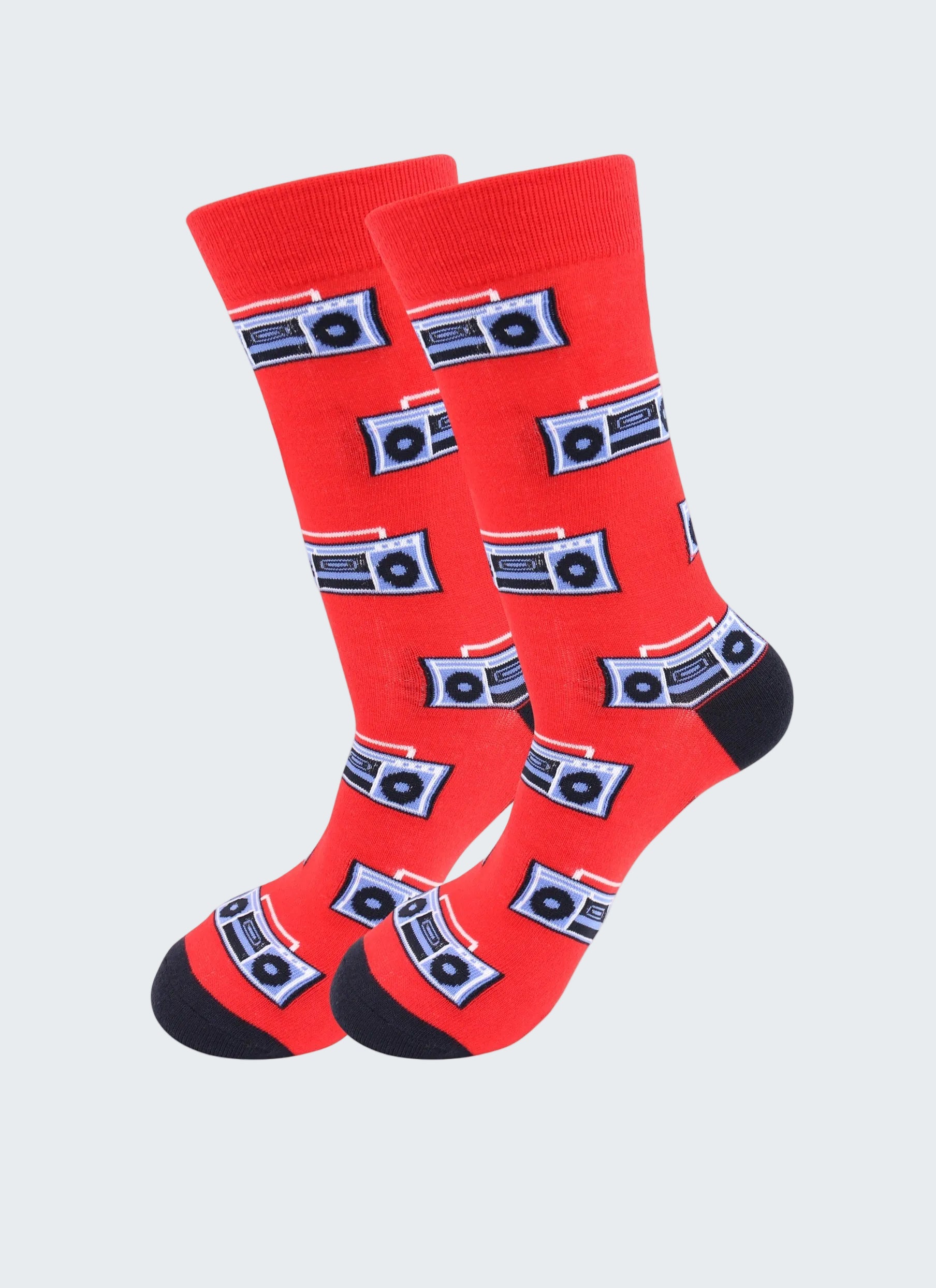 Red socks with cassette tape pattern on a white background