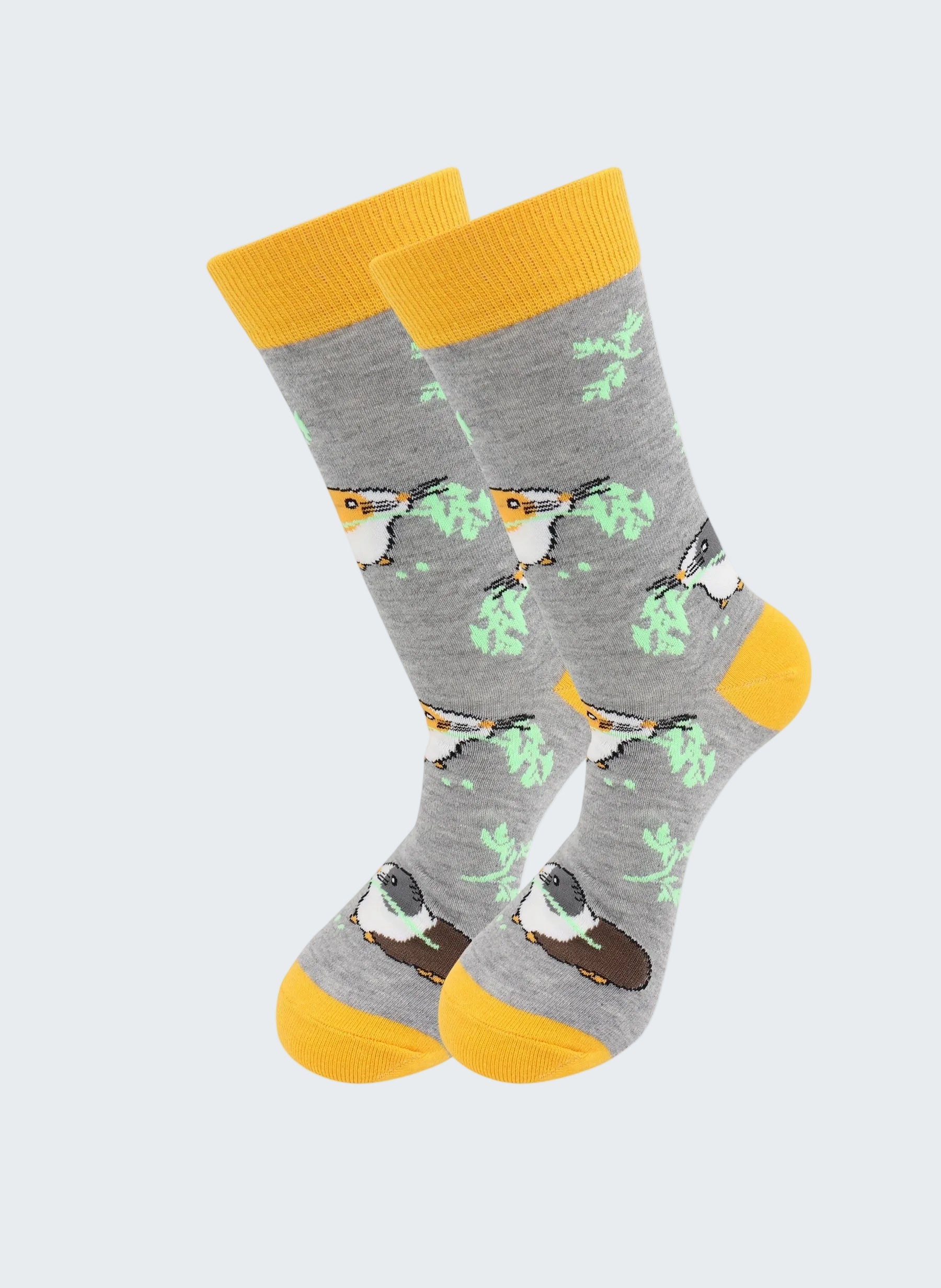 Gray socks with bird pattern and yellow accents on a white background
