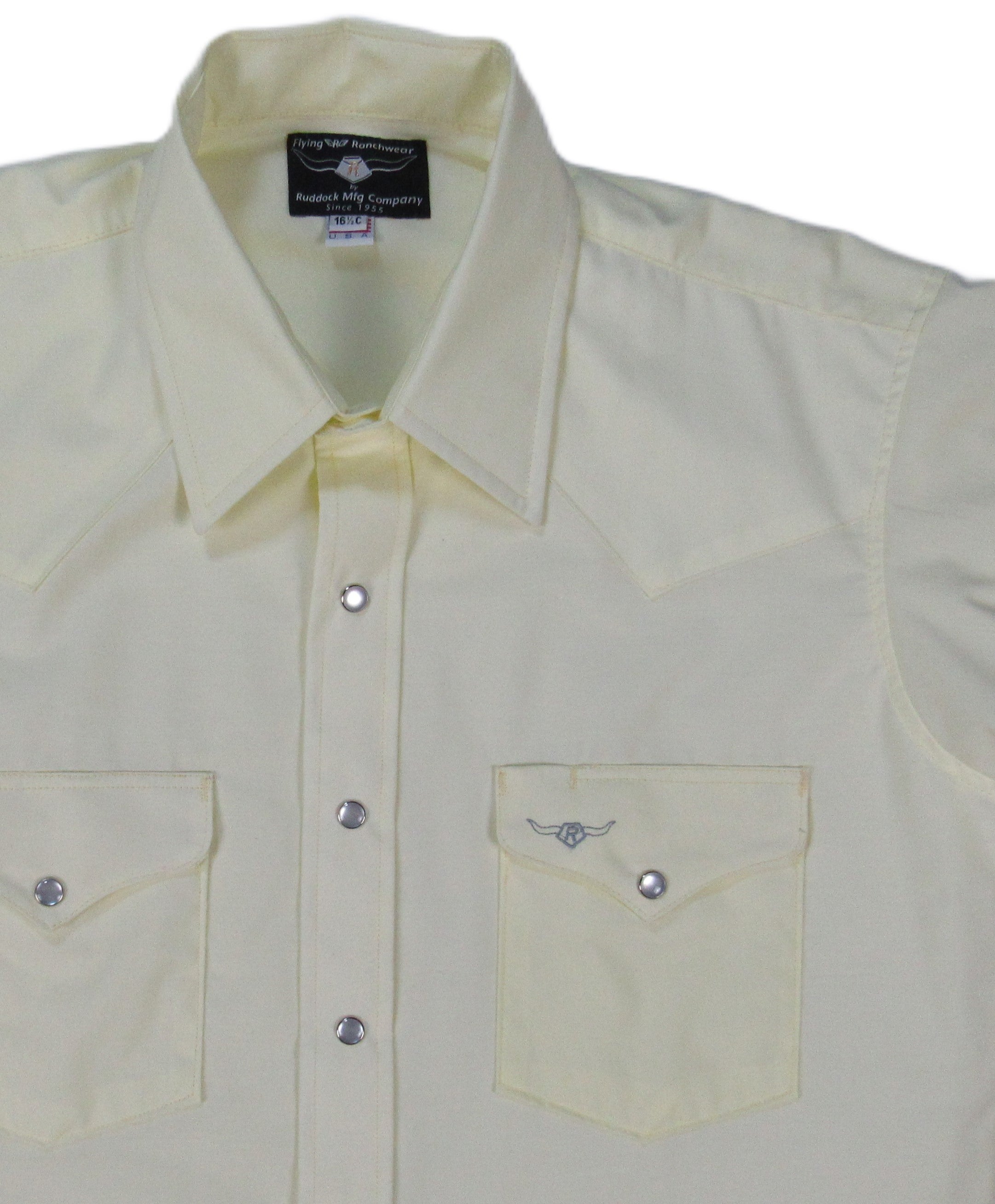 Light-colored shirt with two front pockets on a white background