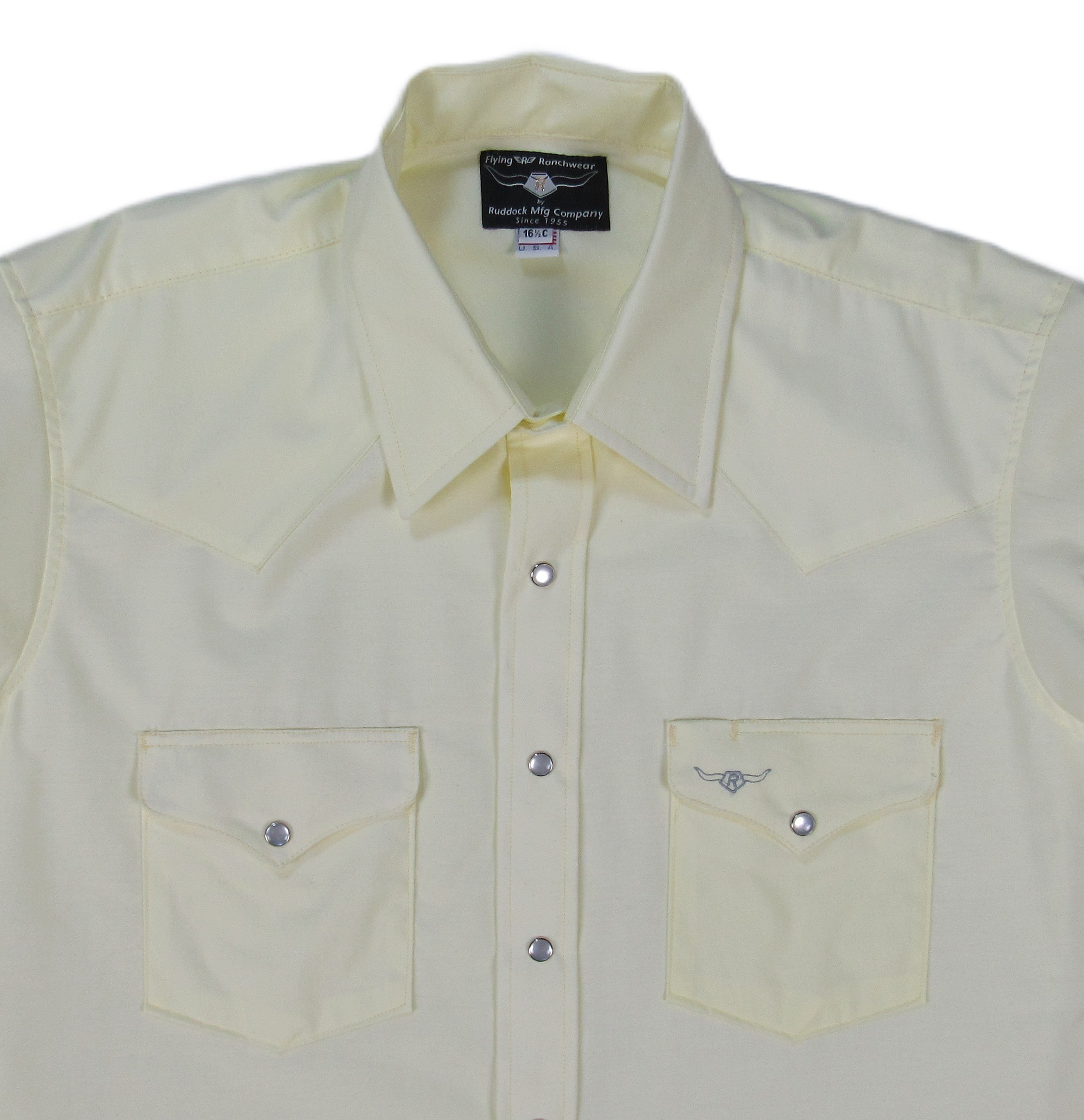 Light yellow shirt with two front pockets on a white background