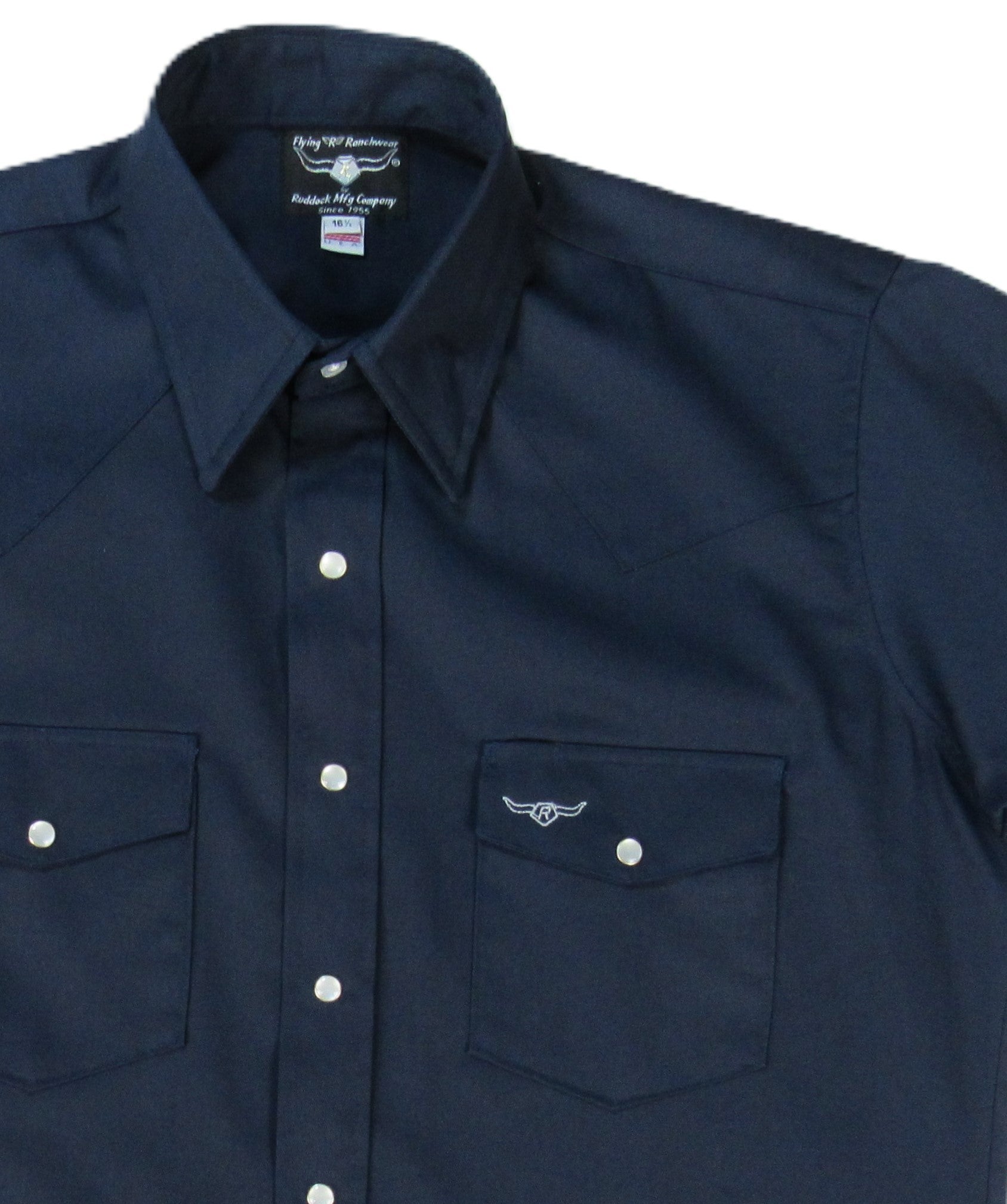 Navy blue shirt with button details on a white background