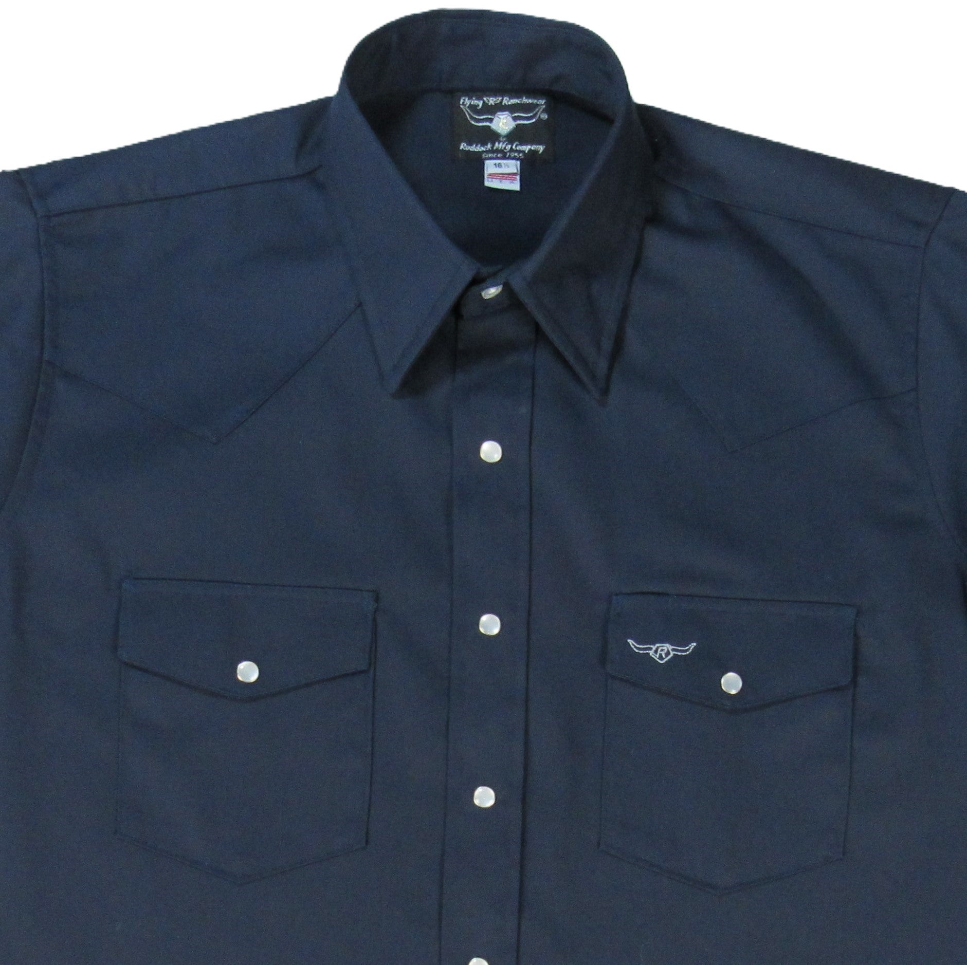 Navy blue shirt with button details on a white background