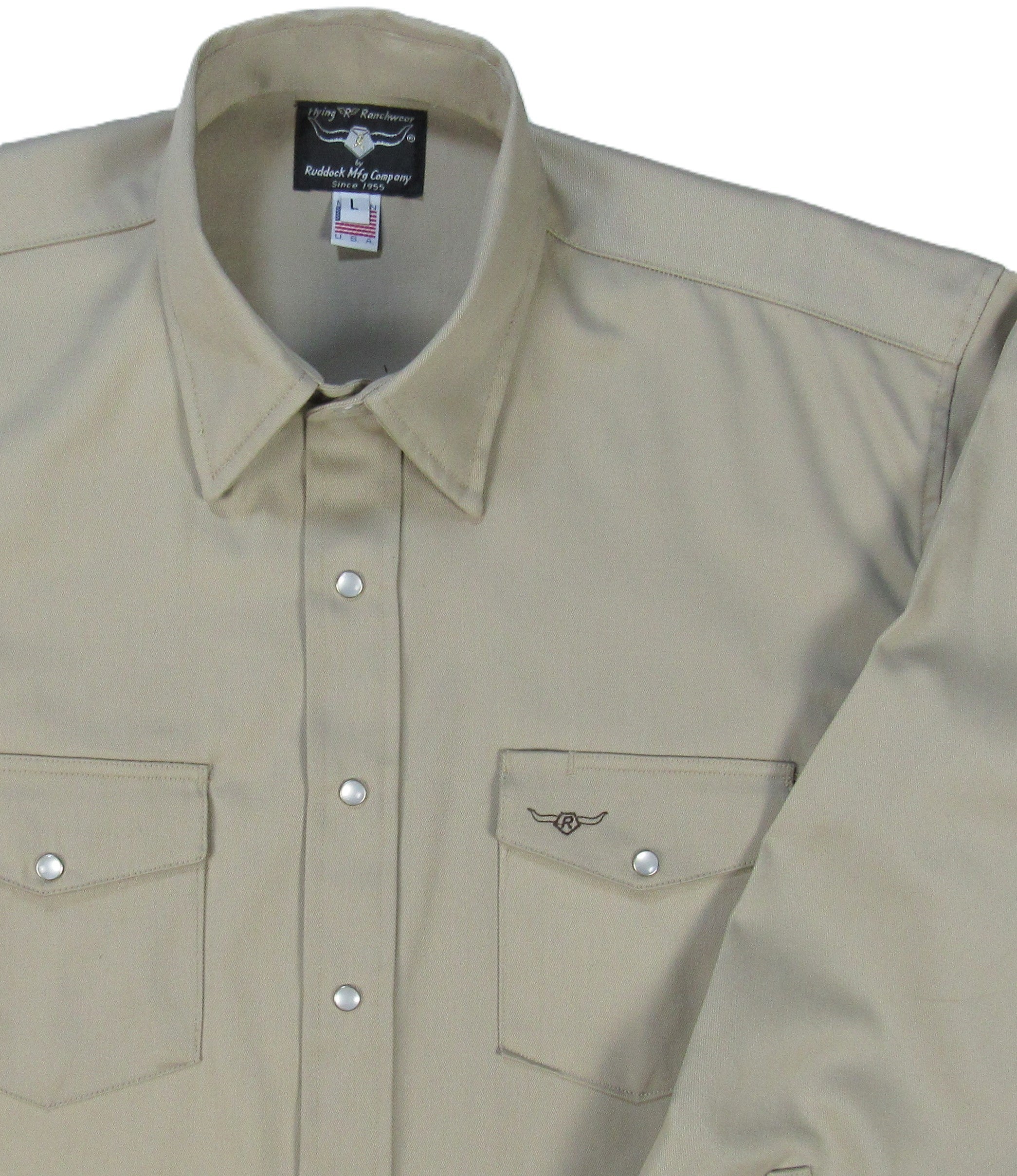 Beige long-sleeve shirt with button details on a white background