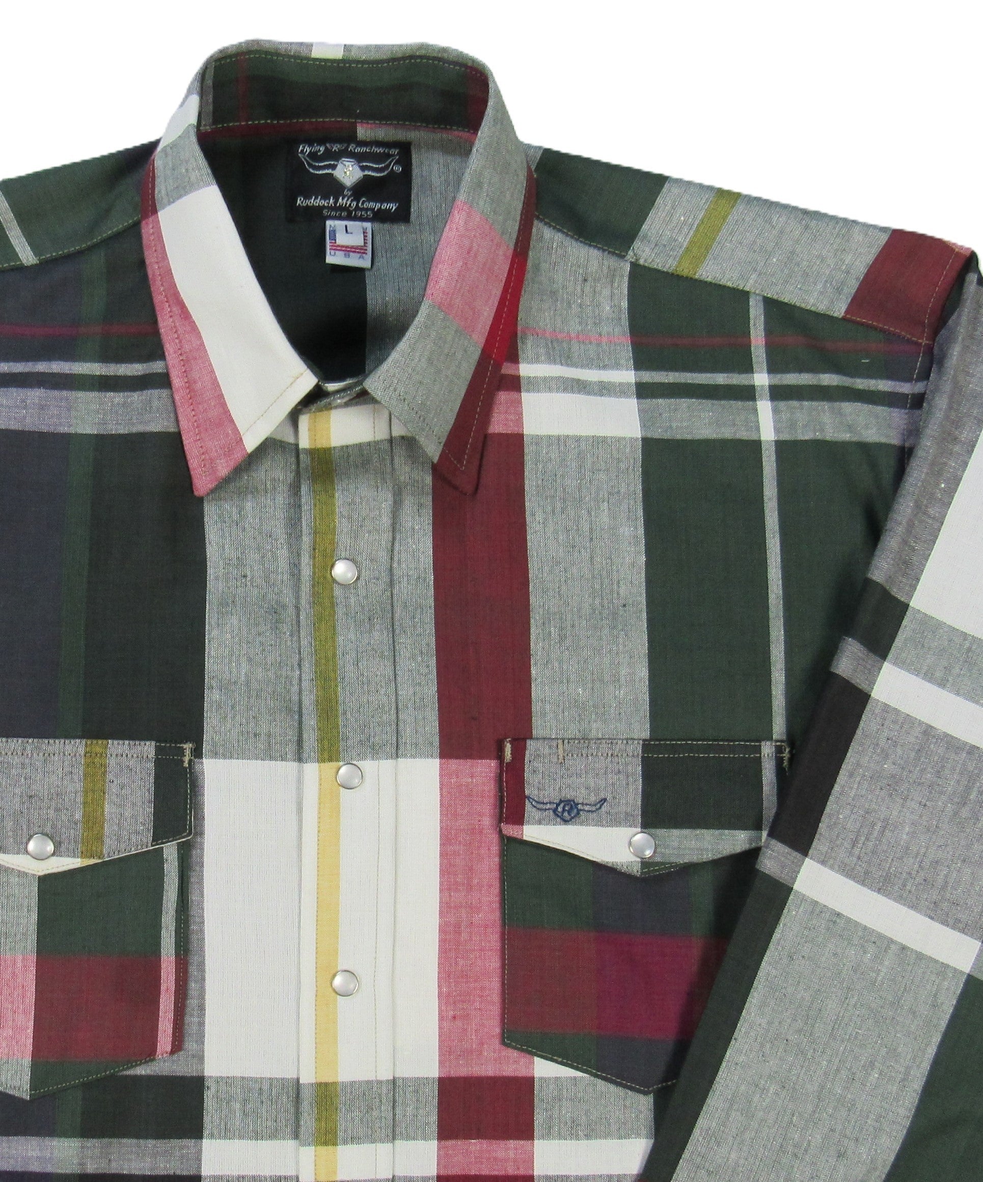 Plaid shirt with a visible brand label on a white background