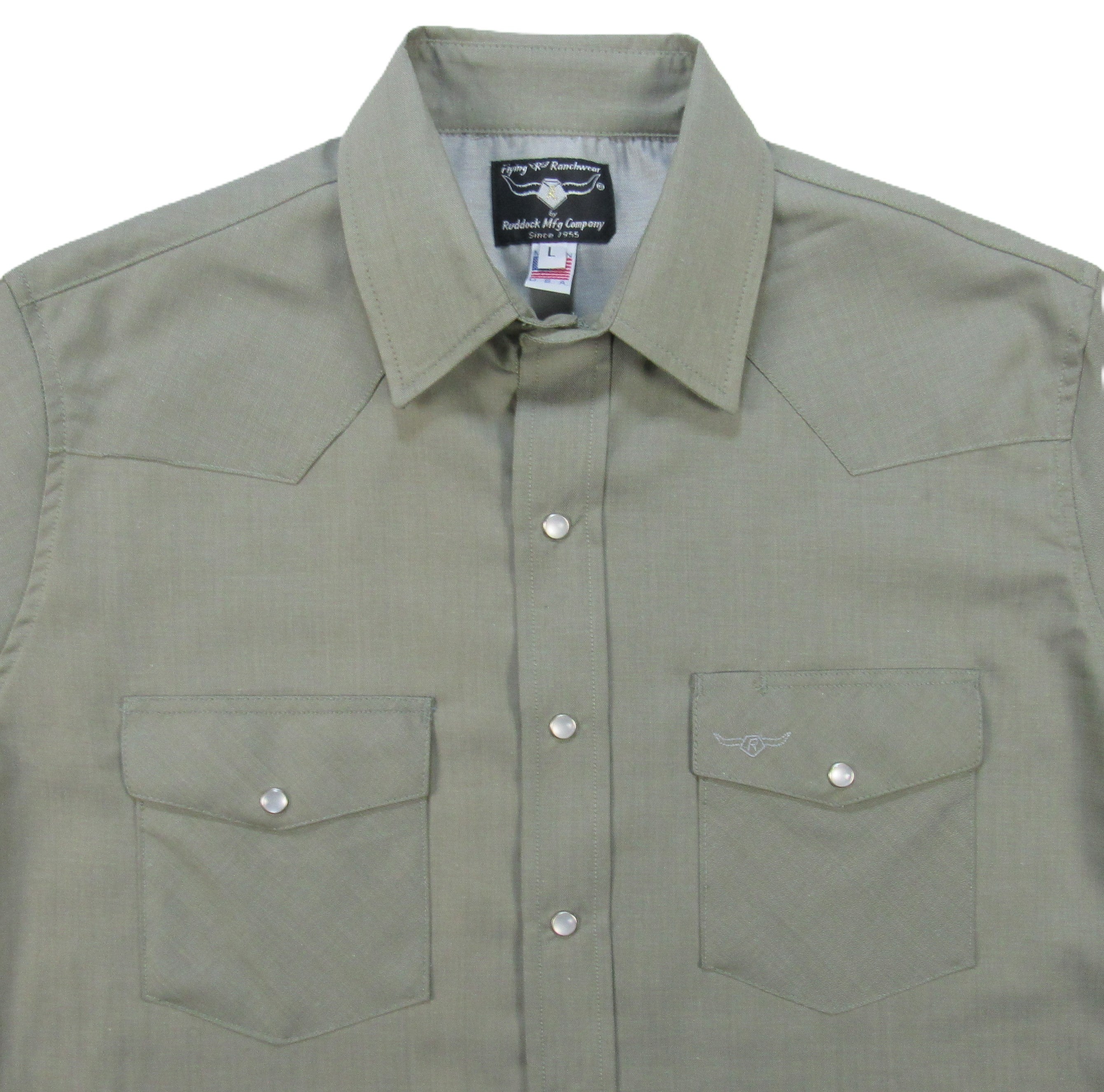 Green shirt with two front pockets and a collar on a white background