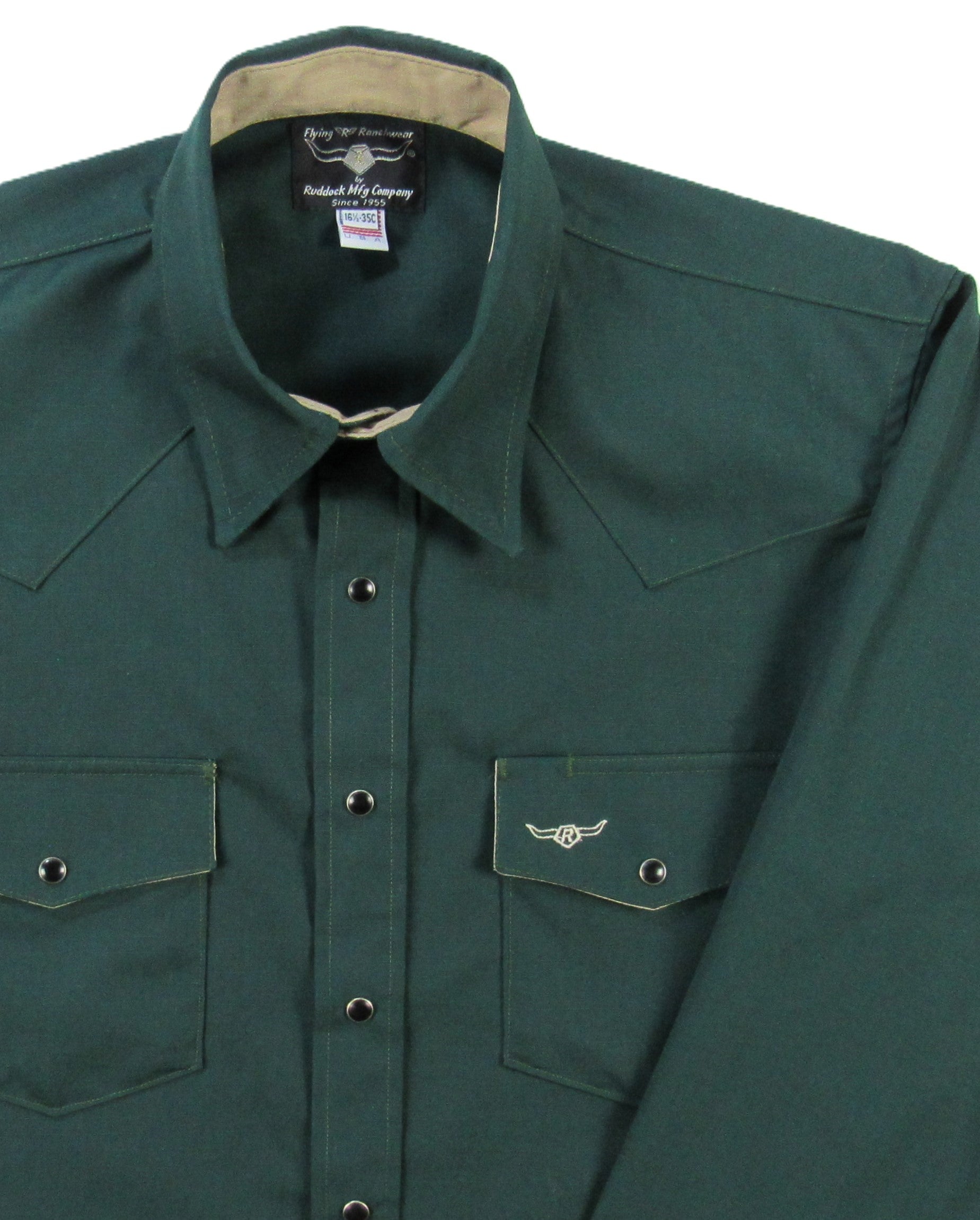 Green shirt with two pockets and buttons on a white background