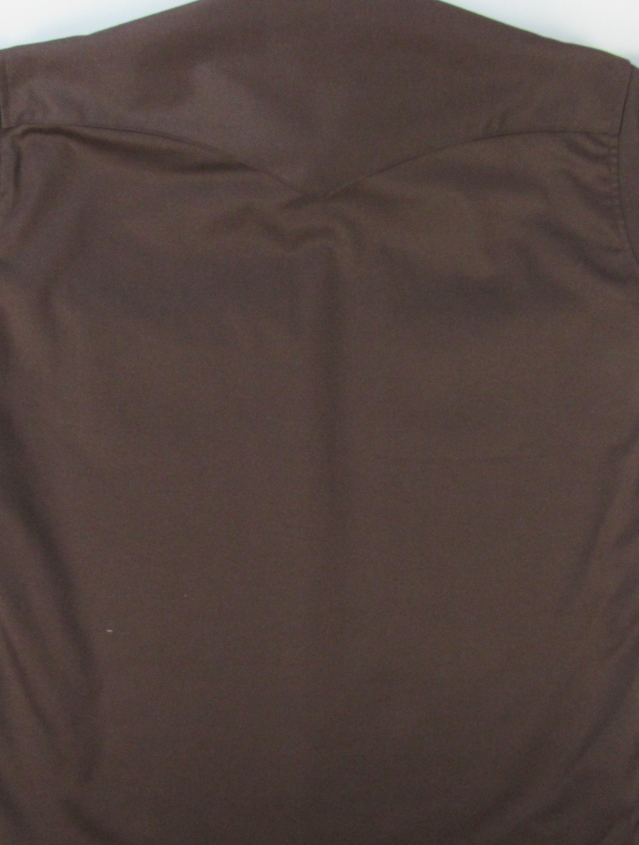 Brown fabric texture on a plain background