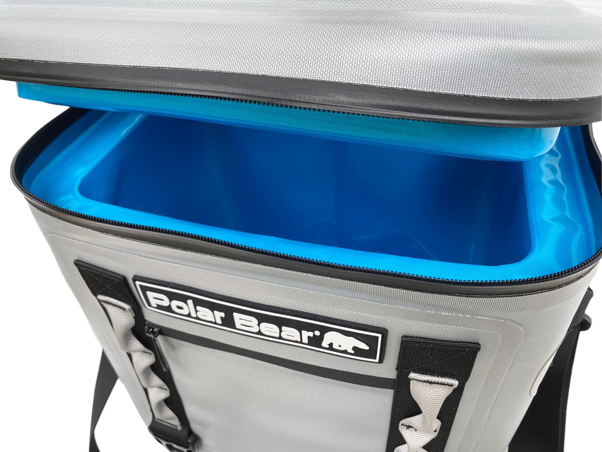 Cooler bag with blue interior and visible 'Polar Bear' brand logo.