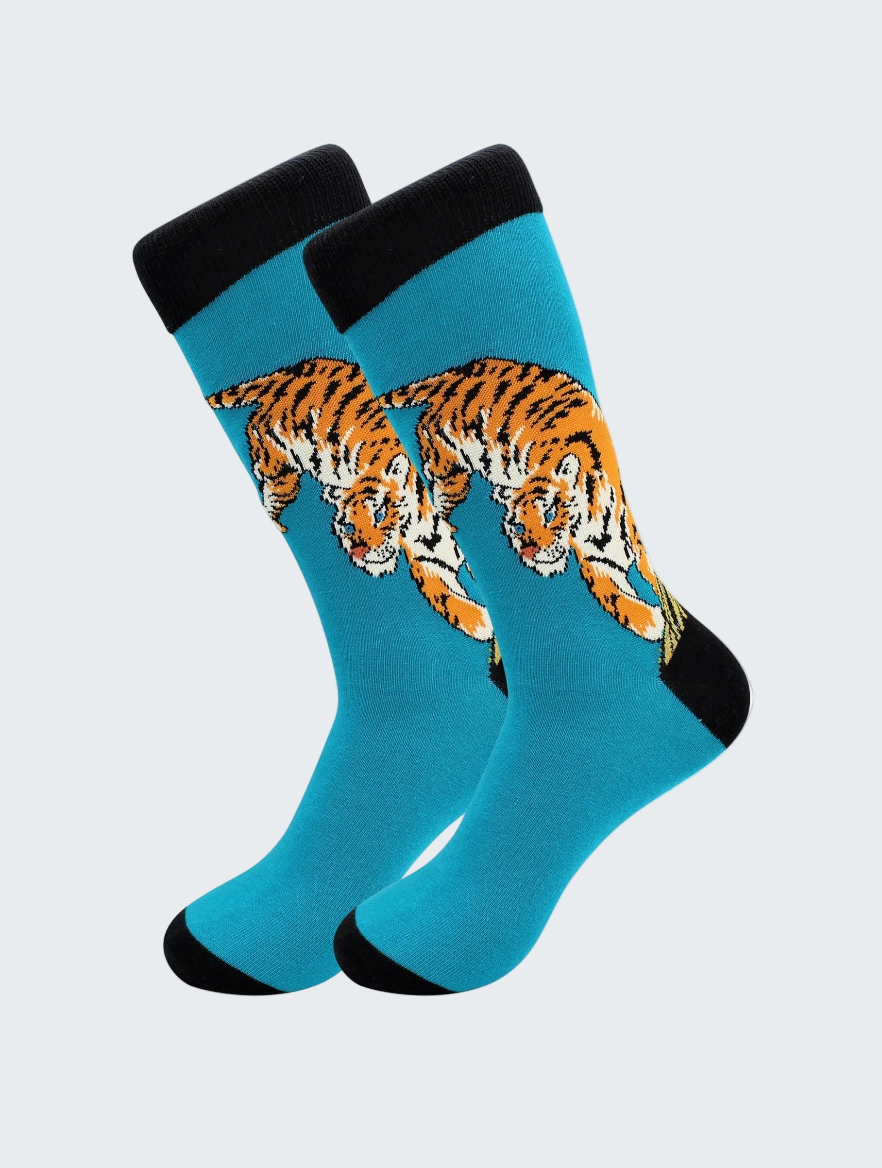 Teal socks with tiger design on a white background