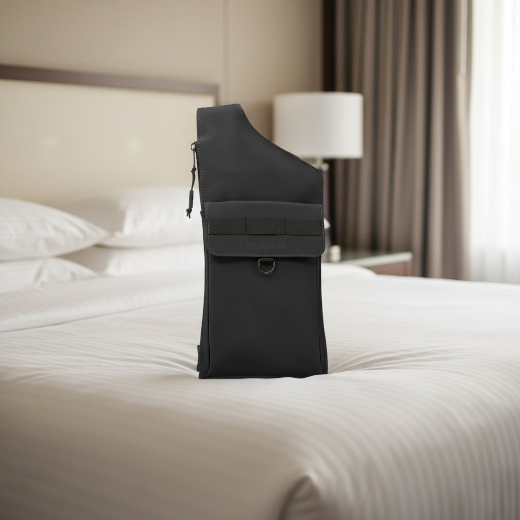 Black one-shoulder bag on a white background