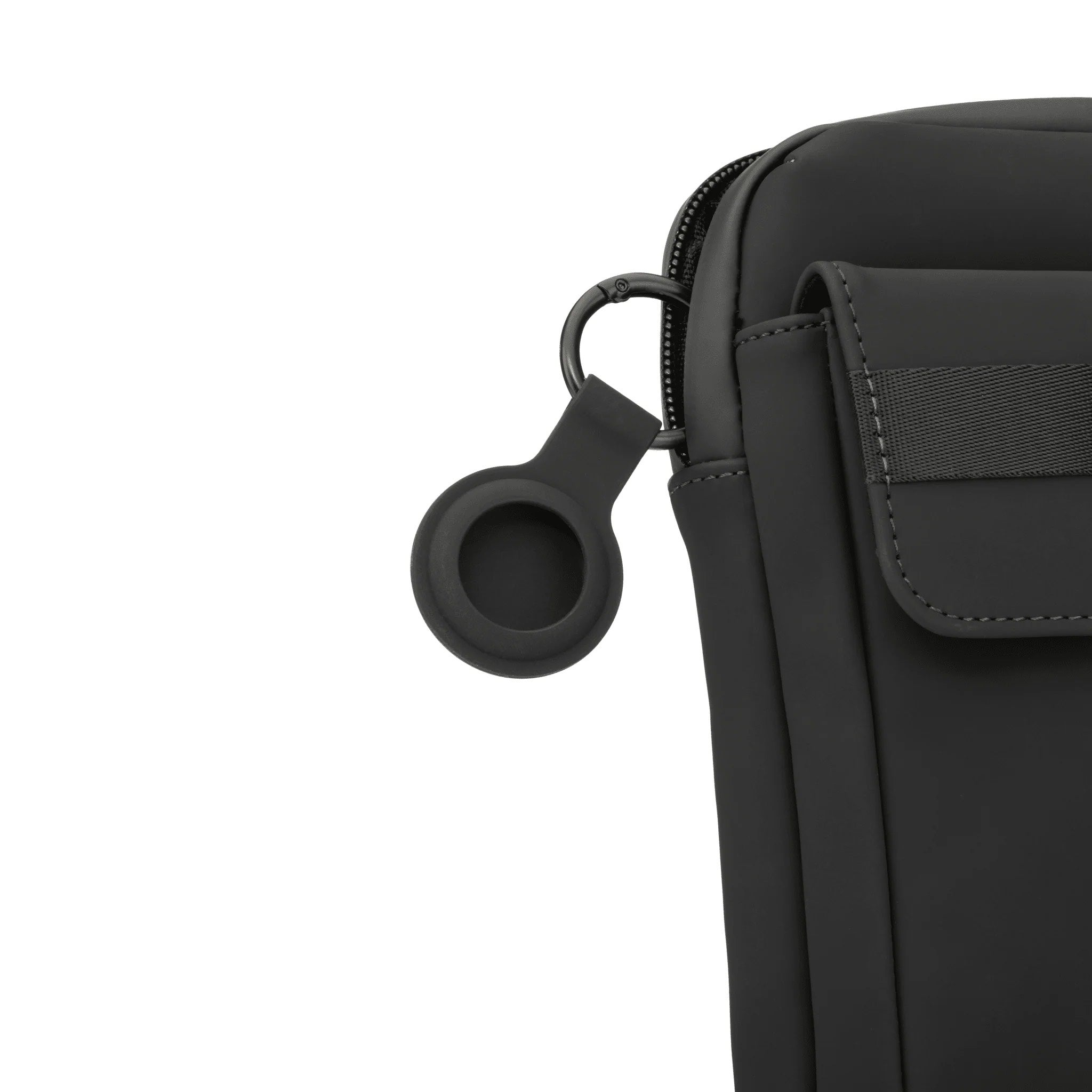 Black bag with a keychain attached on a white background