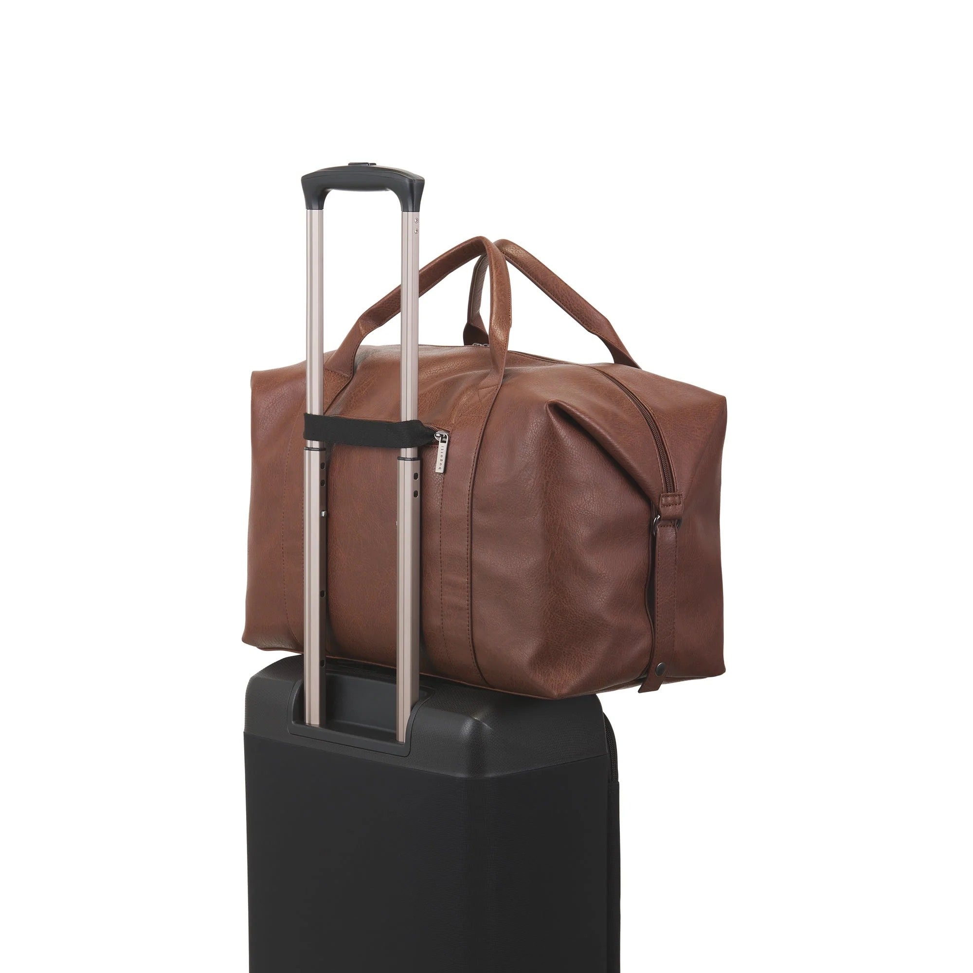 Brown duffel bag on top of a black suitcase with a white background