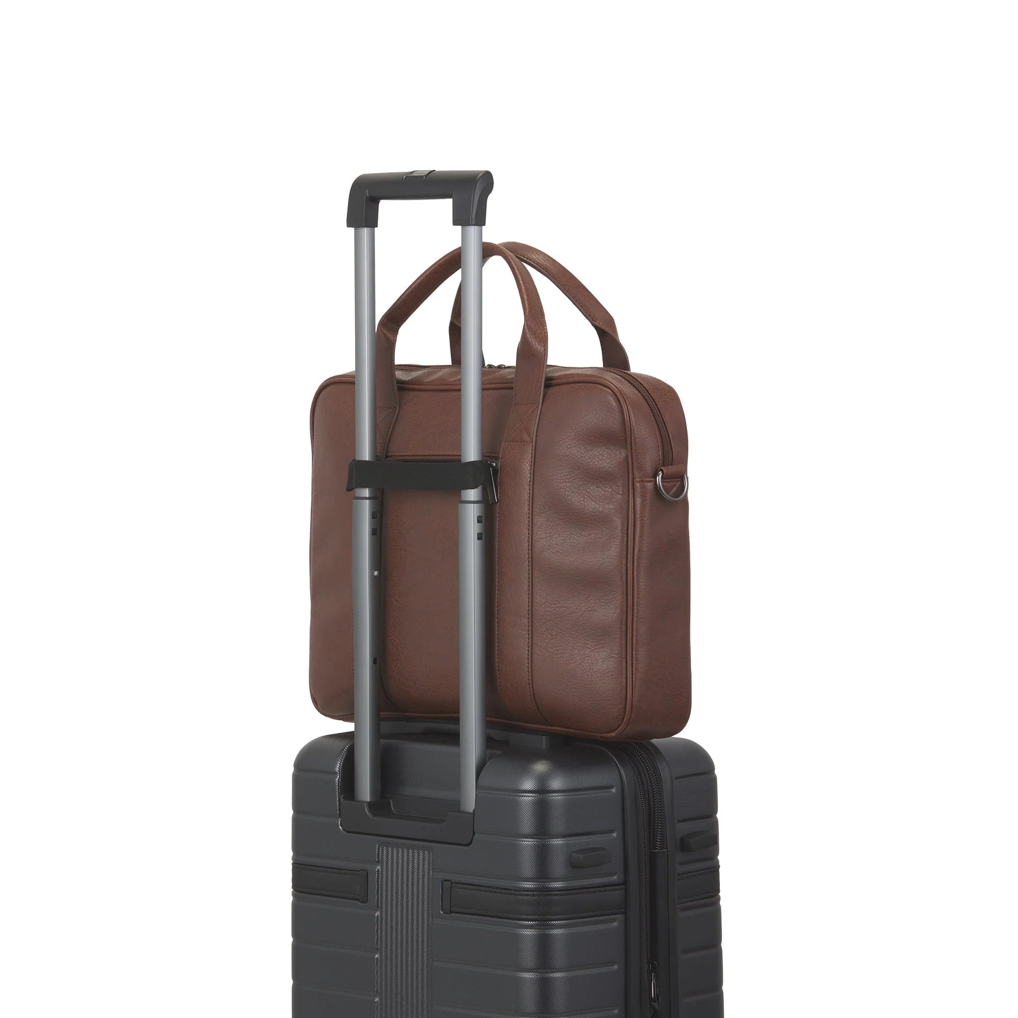Brown leather briefcase on top of a black suitcase with a white background