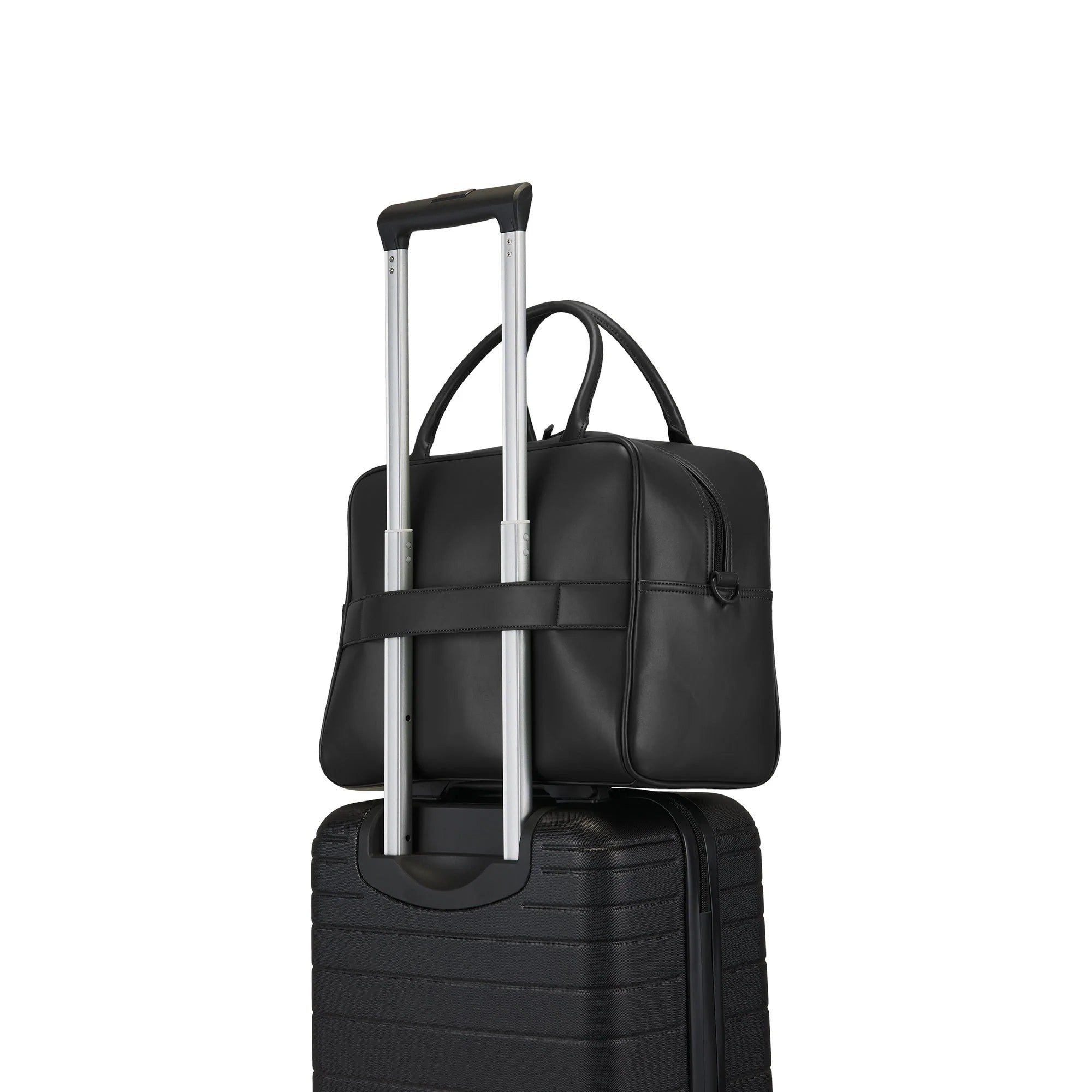 Black rolling suitcase with a matching black backpack on a white background